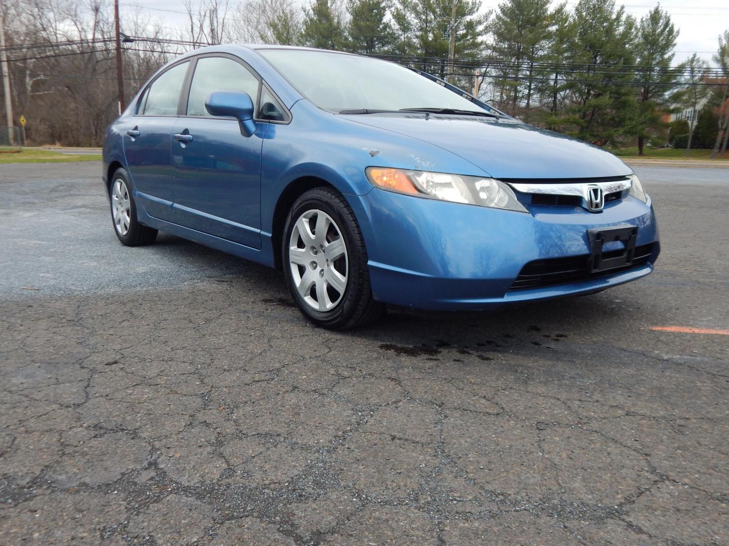 2008 Blue /Gray Honda Civic LX Sedan (1HGFA15528L) with an 1.8L L4 SOHC 16V engine, 5-Speed Manual Overdrive transmission, located at 6528 Lower York Road, New Hope, PA, 18938, (215) 862-9555, 40.358707, -74.977882 - Here we have a ONE OWNER, Honda Civic with a 1.8L inline 4 cylinder engine putting power to the front wheels via a smooth shifting 5 speed manual transmission. Options include: gray cloth, manual seats, AC, heat, AM/FM/CD/AUX radio, tilt steering wheel, cruise control, power windows/locks/mirrors an - Photo#5