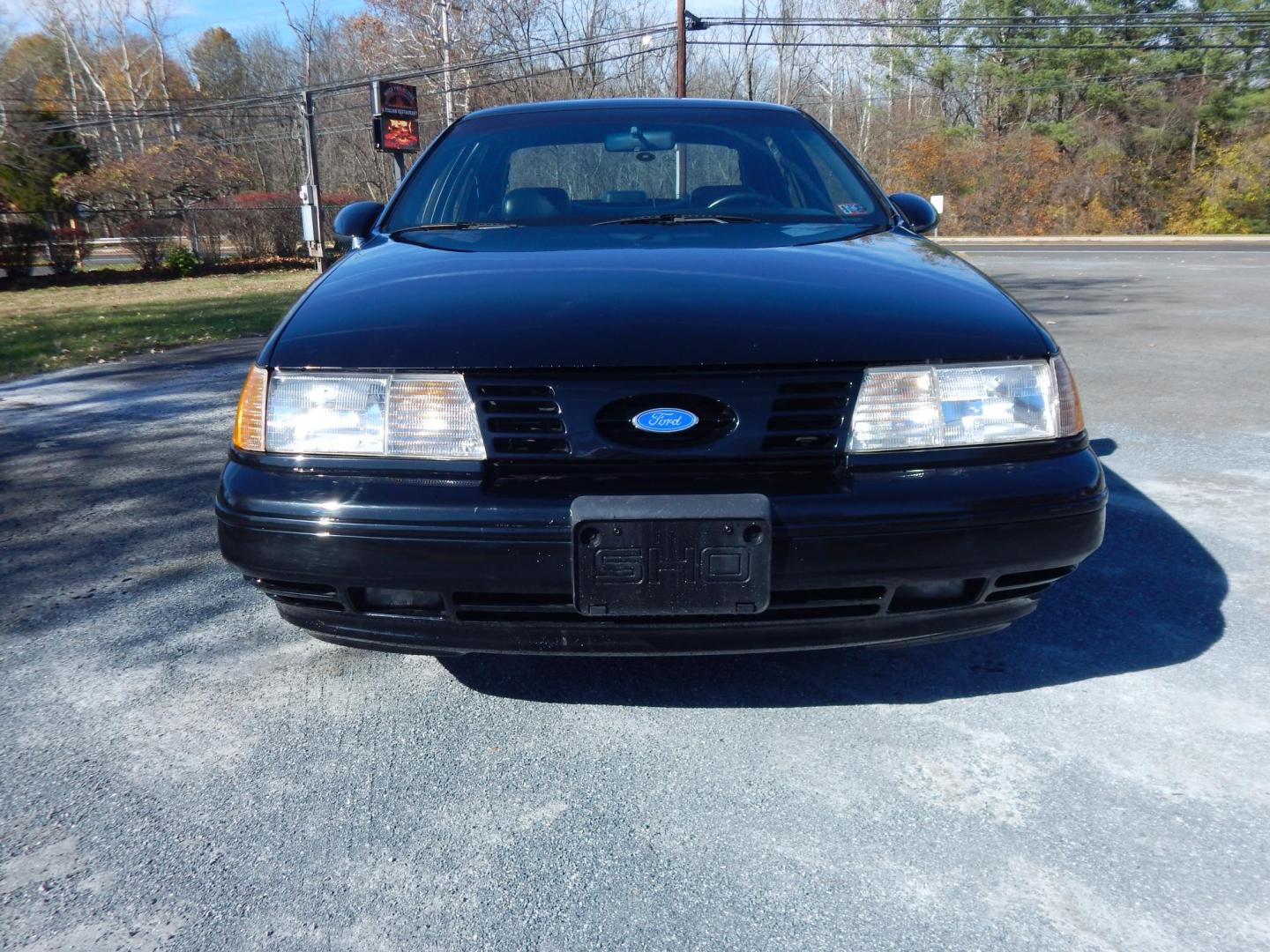 1990 Black /Black Ford Taurus SHO (1FACP54Y1LA) with an 3.0L V6 DOHC 24V engine, 5-Speed Manual Overdrive transmission, located at 6528 Lower York Road, New Hope, PA, 18938, (215) 862-9555, 40.358707, -74.977882 - Here we have a very nicely kept Ford Taurus SHO with a 3.0L V6 putting power to the front wheels via a 5 speed manual transmission. Options include: black leather, power seats, aftermarket JVC radio, heat and AC controls, sunroof, cruise control, tilt steering wheel, power windows/locks/mirrors, pow - Photo#6