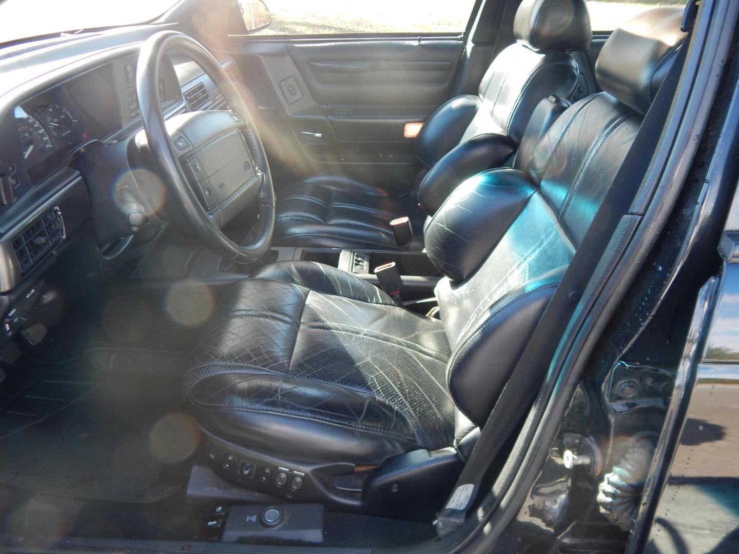 1990 Black /Black Ford Taurus SHO (1FACP54Y1LA) with an 3.0L V6 DOHC 24V engine, 5-Speed Manual Overdrive transmission, located at 6528 Lower York Road, New Hope, PA, 18938, (215) 862-9555, 40.358707, -74.977882 - Here we have a very nicely kept Ford Taurus SHO with a 3.0L V6 putting power to the front wheels via a 5 speed manual transmission. Options include: black leather, power seats, aftermarket JVC radio, heat and AC controls, sunroof, cruise control, tilt steering wheel, power windows/locks/mirrors, pow - Photo#9