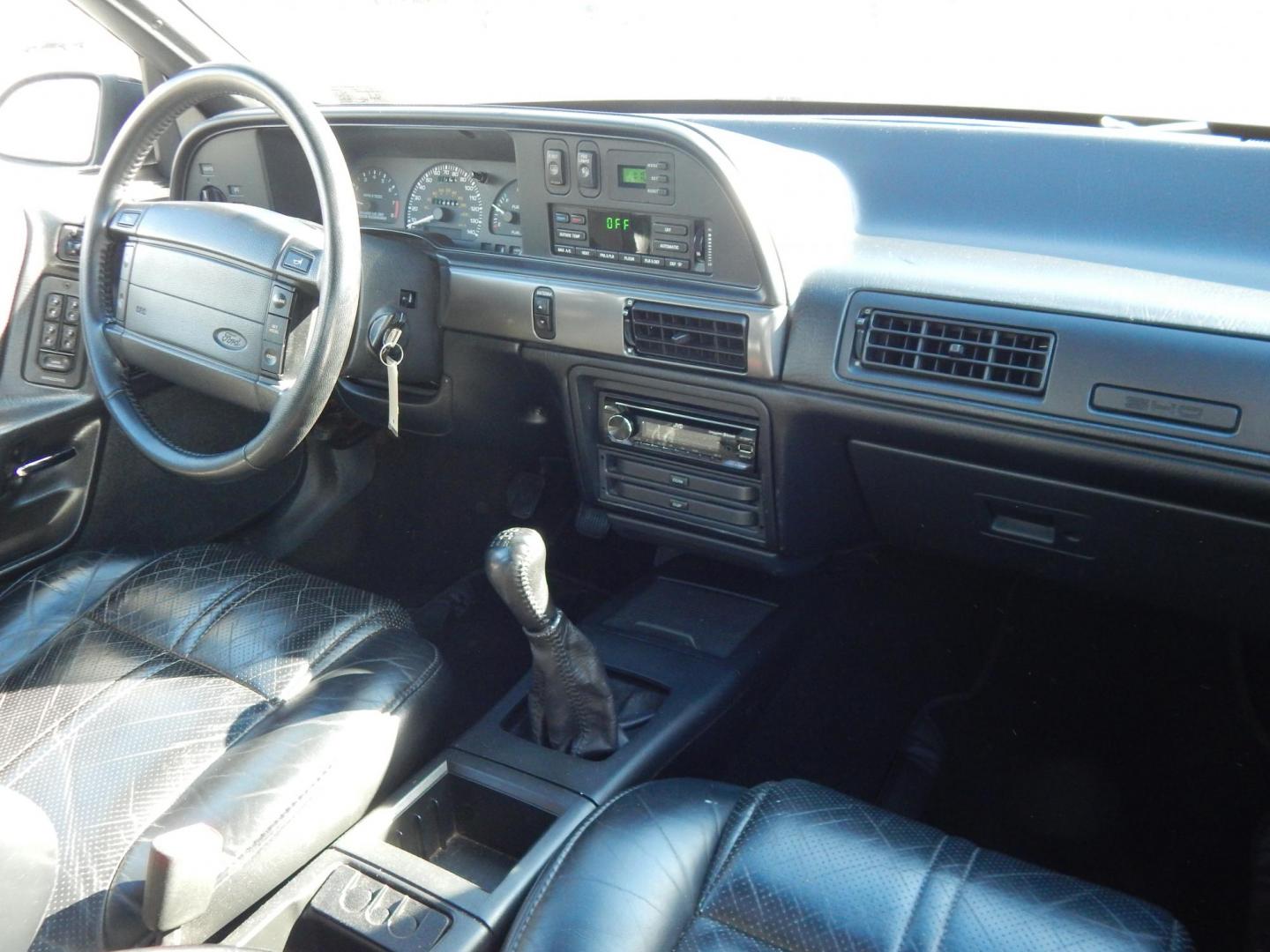 1990 Black /Black Ford Taurus SHO (1FACP54Y1LA) with an 3.0L V6 DOHC 24V engine, 5-Speed Manual Overdrive transmission, located at 6528 Lower York Road, New Hope, PA, 18938, (215) 862-9555, 40.358707, -74.977882 - Here we have a very nicely kept Ford Taurus SHO with a 3.0L V6 putting power to the front wheels via a 5 speed manual transmission. Options include: black leather, power seats, aftermarket JVC radio, heat and AC controls, sunroof, cruise control, tilt steering wheel, power windows/locks/mirrors, pow - Photo#14