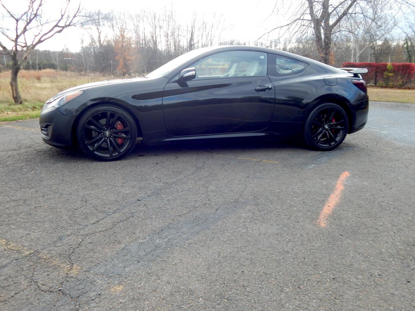 2010 Black /Black Hyundai Genesis Coupe 3.8 Track (KMHHU6KH7AU) with an 3.8L V6 DOHC 24V engine, 6-Speed Automatic transmission, located at 6528 Lower York Road, New Hope, PA, 18938, (215) 862-9555, 40.358707, -74.977882 - Here we have a Hyundai Genesis Coupe Track edition with a 3.8L V6 putting power to the rear wheels via a six speed automatic transmission. Options include: black leather interior but with aftermarket race style bucket seats in the front in white leather, Aftermarket steering wheel "stock wheel is in - Photo#1