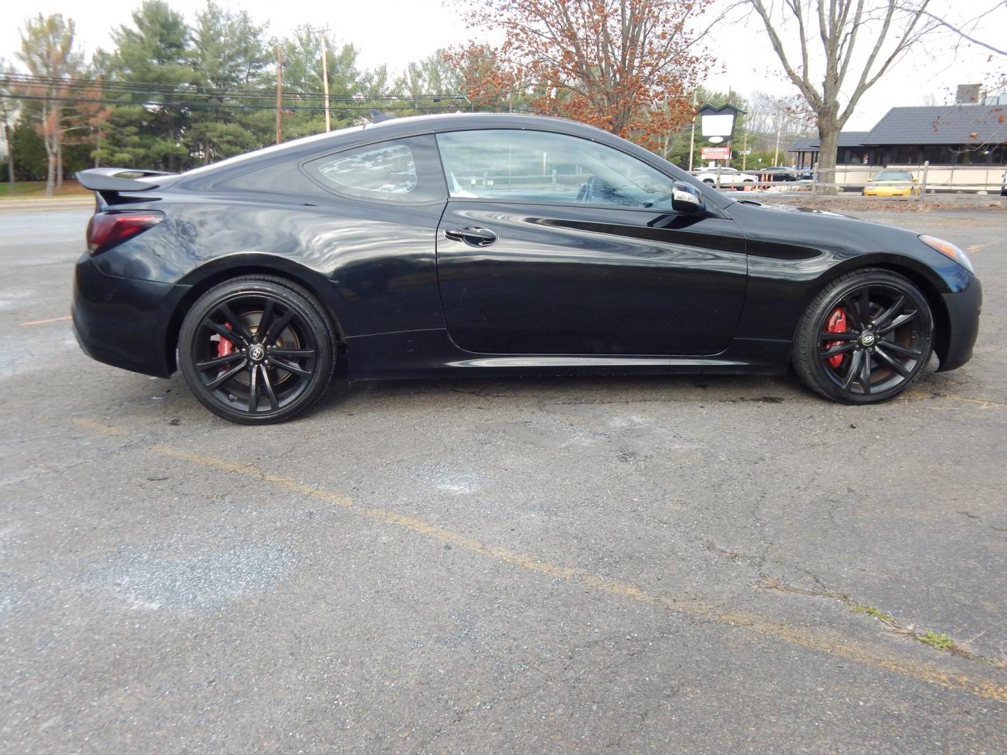2010 Black /Black Hyundai Genesis Coupe 3.8 Track (KMHHU6KH7AU) with an 3.8L V6 DOHC 24V engine, 6-Speed Automatic transmission, located at 6528 Lower York Road, New Hope, PA, 18938, (215) 862-9555, 40.358707, -74.977882 - Here we have a Hyundai Genesis Coupe Track edition with a 3.8L V6 putting power to the rear wheels via a six speed automatic transmission. Options include: black leather interior but with aftermarket race style bucket seats in the front in white leather, Aftermarket steering wheel "stock wheel is in - Photo#4
