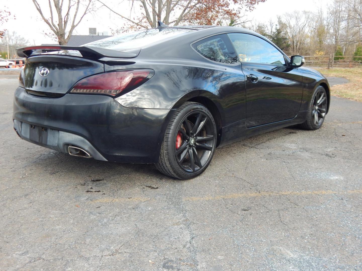 2010 Black /Black Hyundai Genesis Coupe 3.8 Track (KMHHU6KH7AU) with an 3.8L V6 DOHC 24V engine, 6-Speed Automatic transmission, located at 6528 Lower York Road, New Hope, PA, 18938, (215) 862-9555, 40.358707, -74.977882 - Here we have a Hyundai Genesis Coupe Track edition with a 3.8L V6 putting power to the rear wheels via a six speed automatic transmission. Options include: black leather interior but with aftermarket race style bucket seats in the front in white leather, Aftermarket steering wheel "stock wheel is in - Photo#3