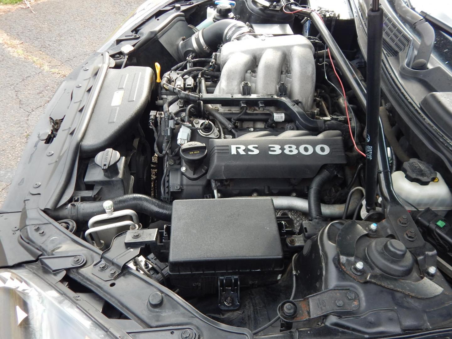 2010 Black /Black Hyundai Genesis Coupe 3.8 Track (KMHHU6KH7AU) with an 3.8L V6 DOHC 24V engine, 6-Speed Automatic transmission, located at 6528 Lower York Road, New Hope, PA, 18938, (215) 862-9555, 40.358707, -74.977882 - Here we have a Hyundai Genesis Coupe Track edition with a 3.8L V6 putting power to the rear wheels via a six speed automatic transmission. Options include: black leather interior but with aftermarket race style bucket seats in the front in white leather, Aftermarket steering wheel "stock wheel is in - Photo#20