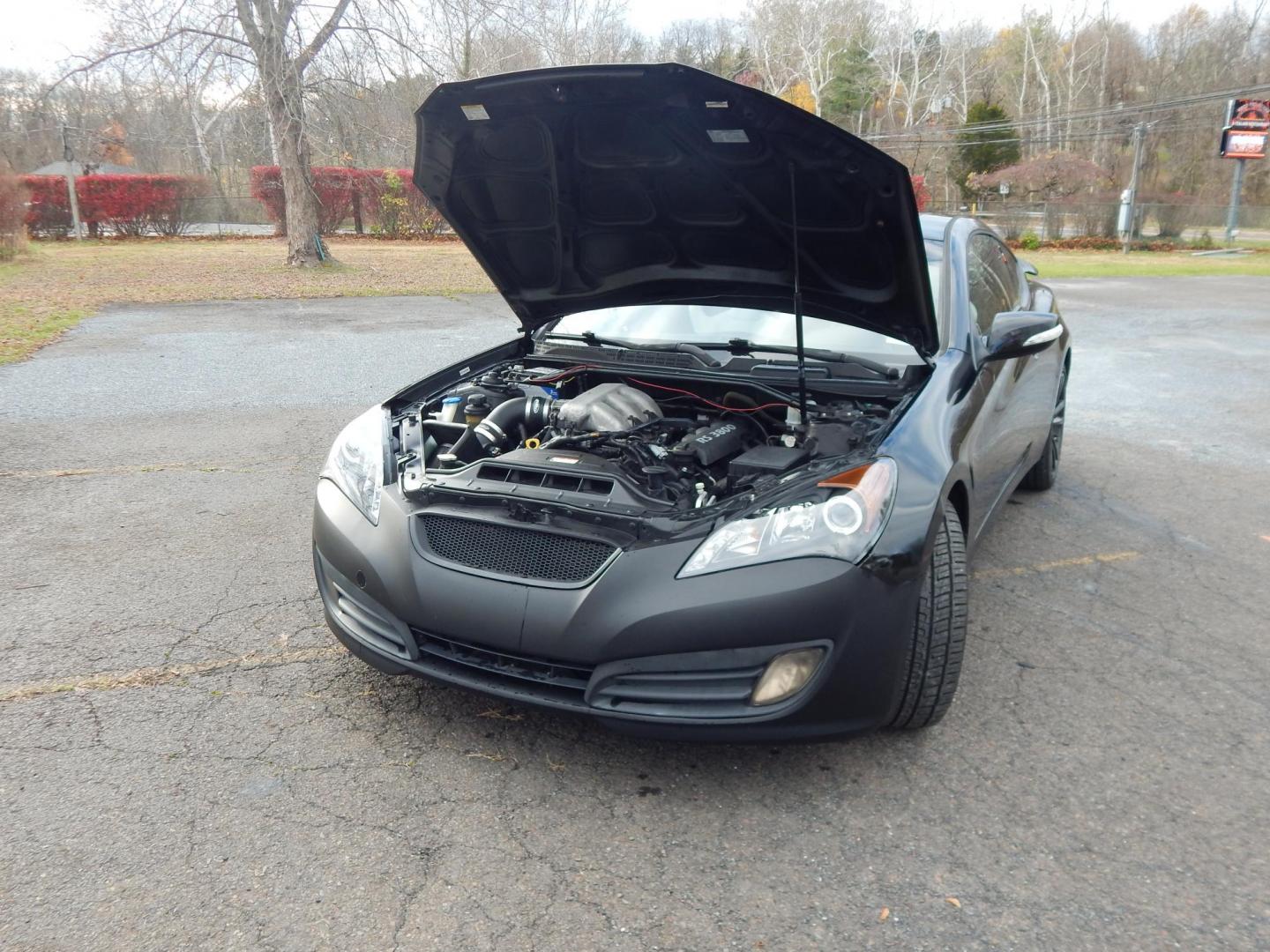 2010 Black /Black Hyundai Genesis Coupe 3.8 Track (KMHHU6KH7AU) with an 3.8L V6 DOHC 24V engine, 6-Speed Automatic transmission, located at 6528 Lower York Road, New Hope, PA, 18938, (215) 862-9555, 40.358707, -74.977882 - Here we have a Hyundai Genesis Coupe Track edition with a 3.8L V6 putting power to the rear wheels via a six speed automatic transmission. Options include: black leather interior but with aftermarket race style bucket seats in the front in white leather, Aftermarket steering wheel "stock wheel is in - Photo#21