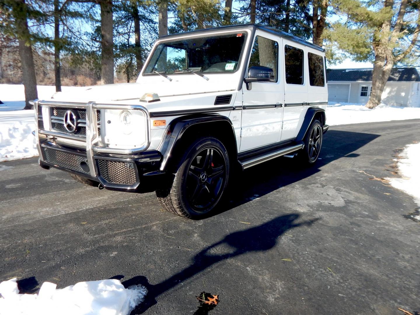 2018 White /black Mercedes-Benz G-Class G63 AMG 4MATIC (WDCYC7DH5JX) with an 5.5L V8 SOHC 24V engine, Automatic transmission, located at 6528 Lower York Road, New Hope, PA, 18938, (215) 862-9555, 40.358707, -74.977882 - Here we have a very cool 2018 Mercedes G63 AMG. This AMG does have a lemon law/buy back title. The problem was solved in 2021 at 32k miles when Mercedes replaced the cylinder head! This G63 has white paint with a black roof, black and red leather interior with carbon fiber trim, dual power heated an - Photo#0