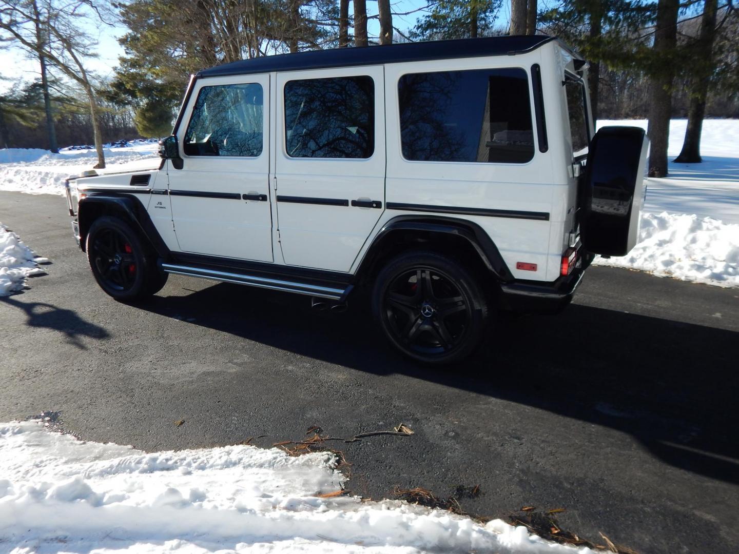 2018 White /black Mercedes-Benz G-Class G63 AMG 4MATIC (WDCYC7DH5JX) with an 5.5L V8 SOHC 24V engine, Automatic transmission, located at 6528 Lower York Road, New Hope, PA, 18938, (215) 862-9555, 40.358707, -74.977882 - Here we have a very cool 2018 Mercedes G63 AMG. This AMG does have a lemon law/buy back title. The problem was solved in 2021 at 32k miles when Mercedes replaced the cylinder head! This G63 has white paint with a black roof, black and red leather interior with carbon fiber trim, dual power heated an - Photo#2