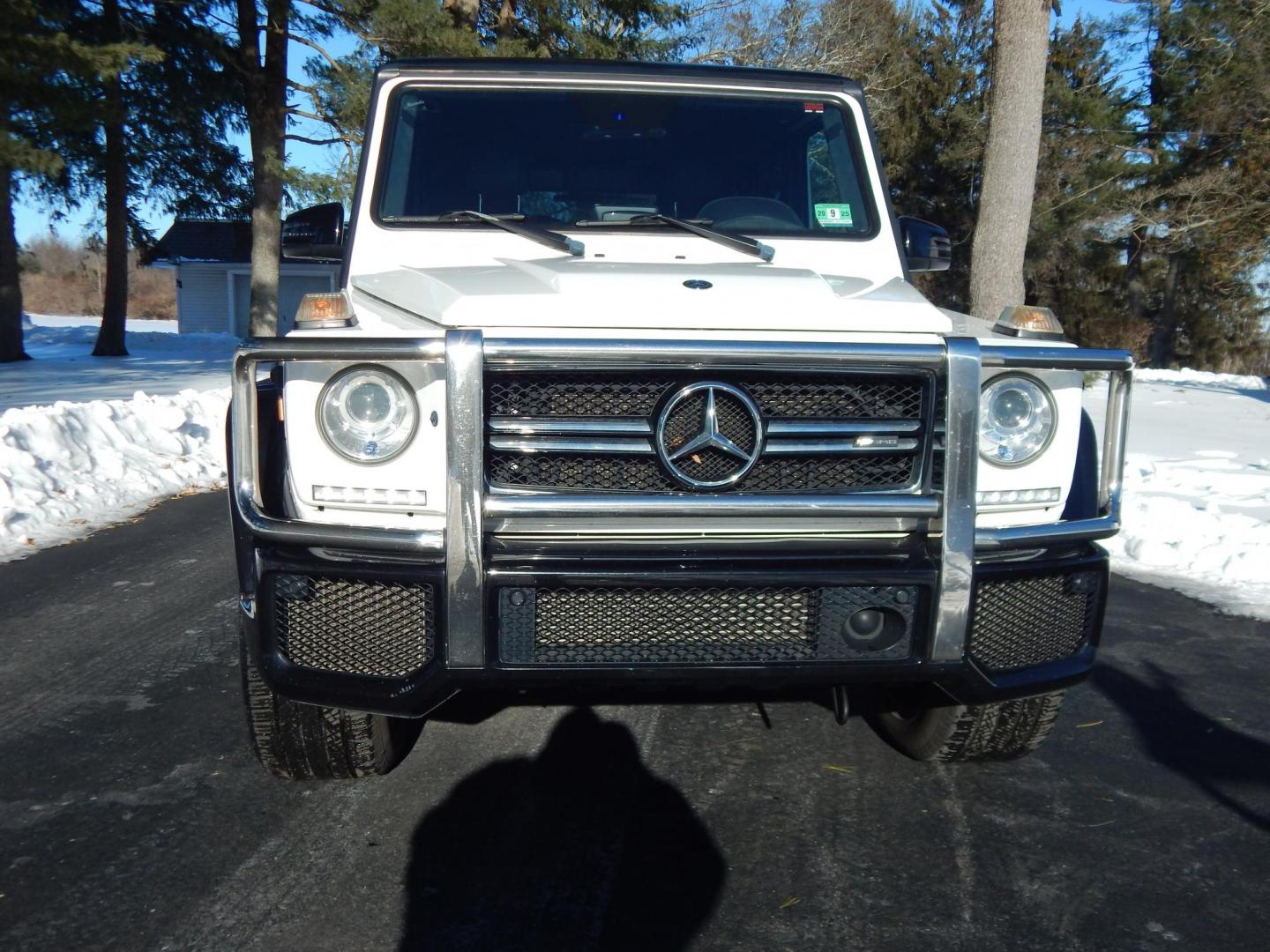 2018 White /black Mercedes-Benz G-Class G63 AMG 4MATIC (WDCYC7DH5JX) with an 5.5L V8 SOHC 24V engine, Automatic transmission, located at 6528 Lower York Road, New Hope, PA, 18938, (215) 862-9555, 40.358707, -74.977882 - Here we have a very cool 2018 Mercedes G63 AMG. This AMG does have a lemon law/buy back title. The problem was solved in 2021 at 32k miles when Mercedes replaced the cylinder head! This G63 has white paint with a black roof, black and red leather interior with carbon fiber trim, dual power heated an - Photo#6