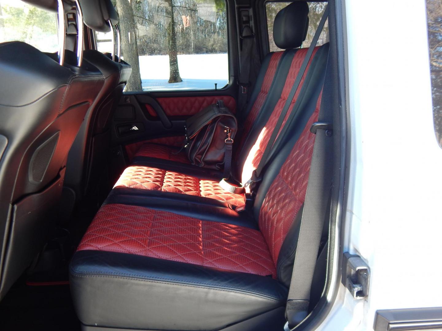 2018 White /black Mercedes-Benz G-Class G63 AMG 4MATIC (WDCYC7DH5JX) with an 5.5L V8 SOHC 24V engine, Automatic transmission, located at 6528 Lower York Road, New Hope, PA, 18938, (215) 862-9555, 40.358707, -74.977882 - Here we have a very cool 2018 Mercedes G63 AMG. This AMG does have a lemon law/buy back title. The problem was solved in 2021 at 32k miles when Mercedes replaced the cylinder head! This G63 has white paint with a black roof, black and red leather interior with carbon fiber trim, dual power heated an - Photo#10