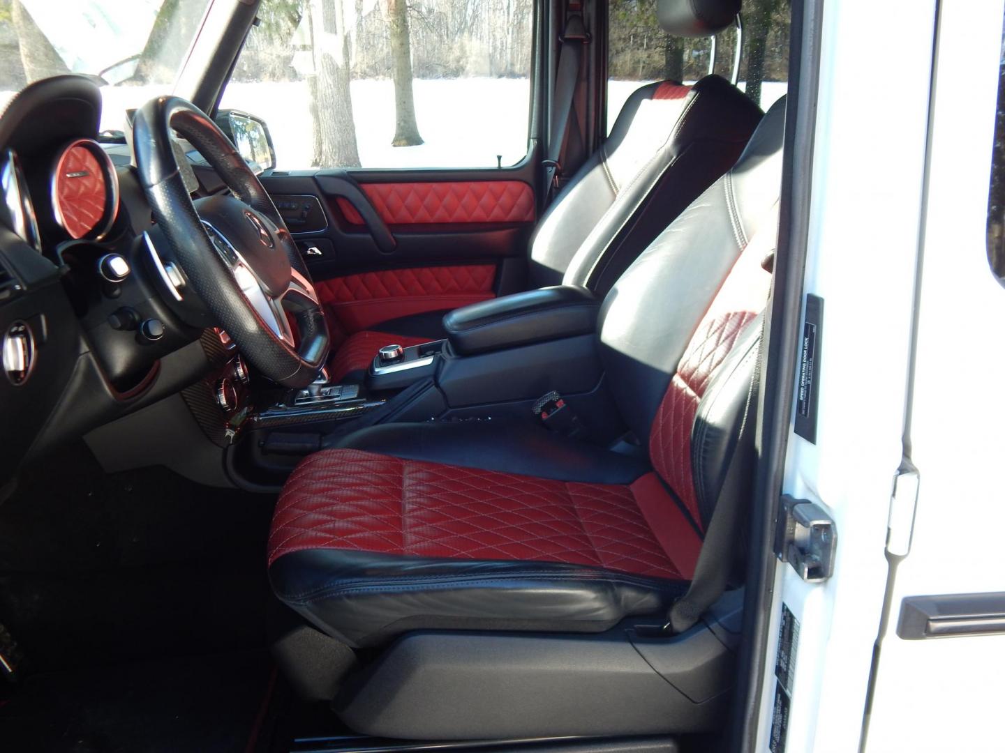 2018 White /black Mercedes-Benz G-Class G63 AMG 4MATIC (WDCYC7DH5JX) with an 5.5L V8 SOHC 24V engine, Automatic transmission, located at 6528 Lower York Road, New Hope, PA, 18938, (215) 862-9555, 40.358707, -74.977882 - Here we have a very cool 2018 Mercedes G63 AMG. This AMG does have a lemon law/buy back title. The problem was solved in 2021 at 32k miles when Mercedes replaced the cylinder head! This G63 has white paint with a black roof, black and red leather interior with carbon fiber trim, dual power heated an - Photo#9