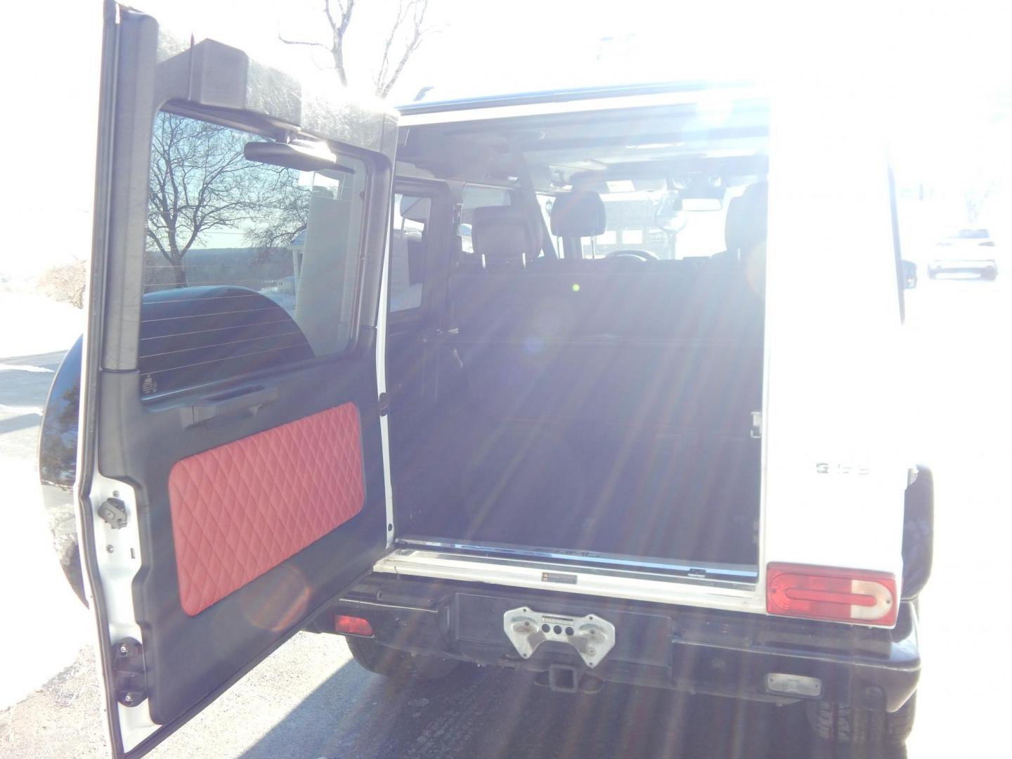 2018 White /black Mercedes-Benz G-Class G63 AMG 4MATIC (WDCYC7DH5JX) with an 5.5L V8 SOHC 24V engine, Automatic transmission, located at 6528 Lower York Road, New Hope, PA, 18938, (215) 862-9555, 40.358707, -74.977882 - Here we have a very cool 2018 Mercedes G63 AMG. This AMG does have a lemon law/buy back title. The problem was solved in 2021 at 32k miles when Mercedes replaced the cylinder head! This G63 has white paint with a black roof, black and red leather interior with carbon fiber trim, dual power heated an - Photo#14