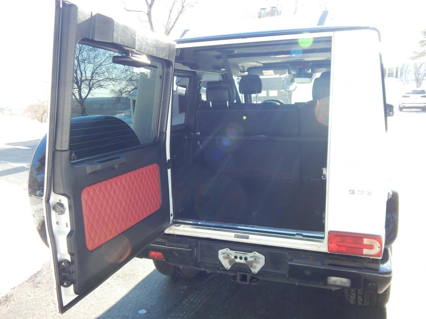 2018 White /black Mercedes-Benz G-Class G63 AMG 4MATIC (WDCYC7DH5JX) with an 5.5L V8 SOHC 24V engine, Automatic transmission, located at 6528 Lower York Road, New Hope, PA, 18938, (215) 862-9555, 40.358707, -74.977882 - Here we have a very cool 2018 Mercedes G63 AMG. This AMG does have a lemon law/buy back title. The problem was solved in 2021 at 32k miles when Mercedes replaced the cylinder head! This G63 has white paint with a black roof, black and red leather interior with carbon fiber trim, dual power heated an - Photo#13