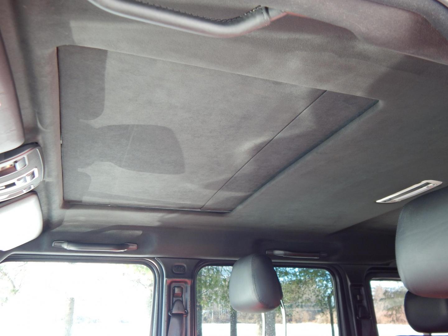 2018 White /black Mercedes-Benz G-Class G63 AMG 4MATIC (WDCYC7DH5JX) with an 5.5L V8 SOHC 24V engine, Automatic transmission, located at 6528 Lower York Road, New Hope, PA, 18938, (215) 862-9555, 40.358707, -74.977882 - Here we have a very cool 2018 Mercedes G63 AMG. This AMG does have a lemon law/buy back title. The problem was solved in 2021 at 32k miles when Mercedes replaced the cylinder head! This G63 has white paint with a black roof, black and red leather interior with carbon fiber trim, dual power heated an - Photo#12