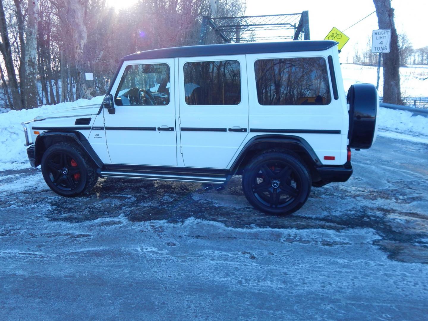 2018 White /black Mercedes-Benz G-Class G63 AMG 4MATIC (WDCYC7DH5JX) with an 5.5L V8 SOHC 24V engine, Automatic transmission, located at 6528 Lower York Road, New Hope, PA, 18938, (215) 862-9555, 40.358707, -74.977882 - Here we have a very cool 2018 Mercedes G63 AMG. This AMG does have a lemon law/buy back title. The problem was solved in 2021 at 32k miles when Mercedes replaced the cylinder head! This G63 has white paint with a black roof, black and red leather interior with carbon fiber trim, dual power heated an - Photo#28
