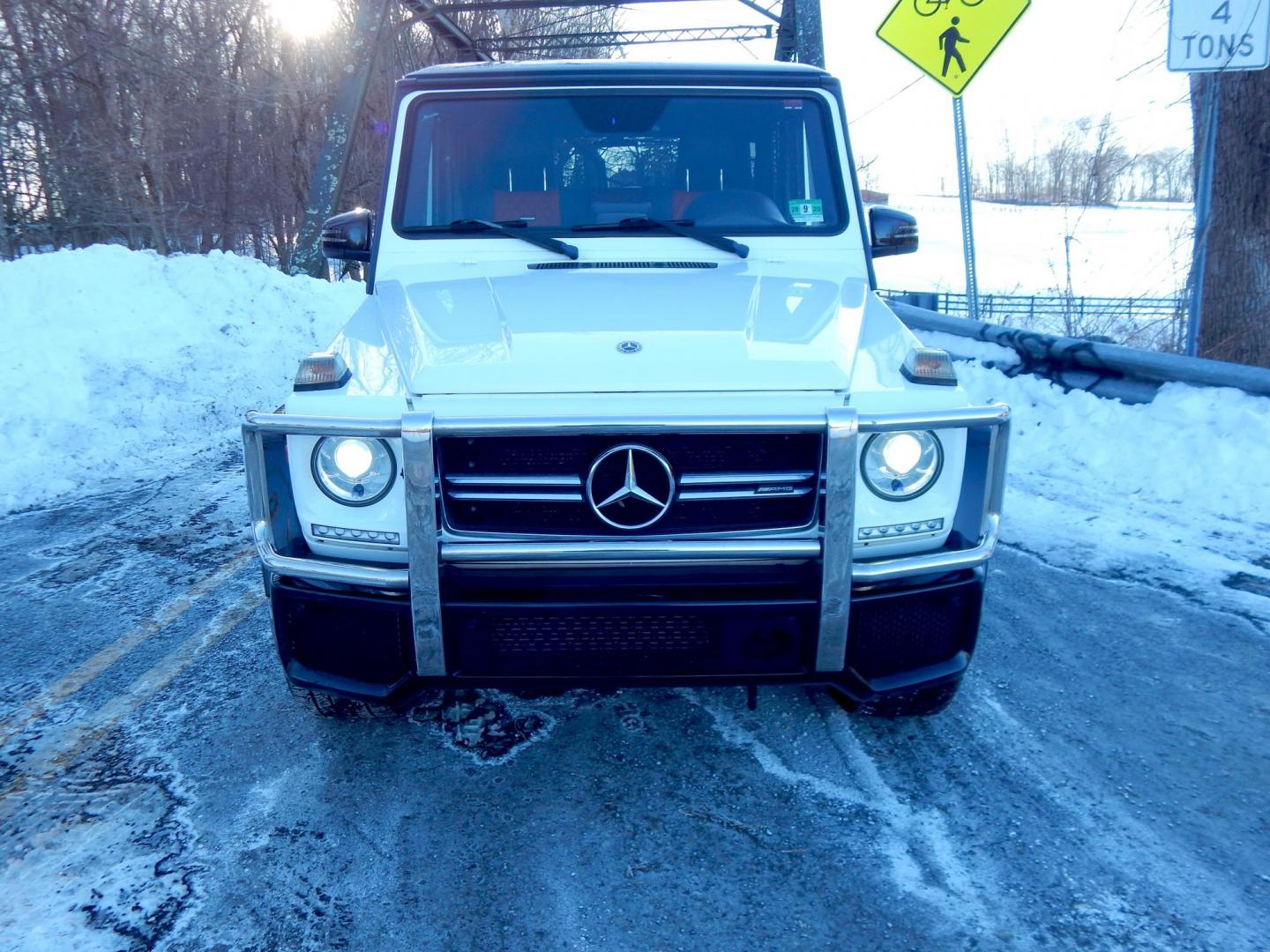 2018 White /black Mercedes-Benz G-Class G63 AMG 4MATIC (WDCYC7DH5JX) with an 5.5L V8 SOHC 24V engine, Automatic transmission, located at 6528 Lower York Road, New Hope, PA, 18938, (215) 862-9555, 40.358707, -74.977882 - Here we have a very cool 2018 Mercedes G63 AMG. This AMG does have a lemon law/buy back title. The problem was solved in 2021 at 32k miles when Mercedes replaced the cylinder head! This G63 has white paint with a black roof, black and red leather interior with carbon fiber trim, dual power heated an - Photo#37