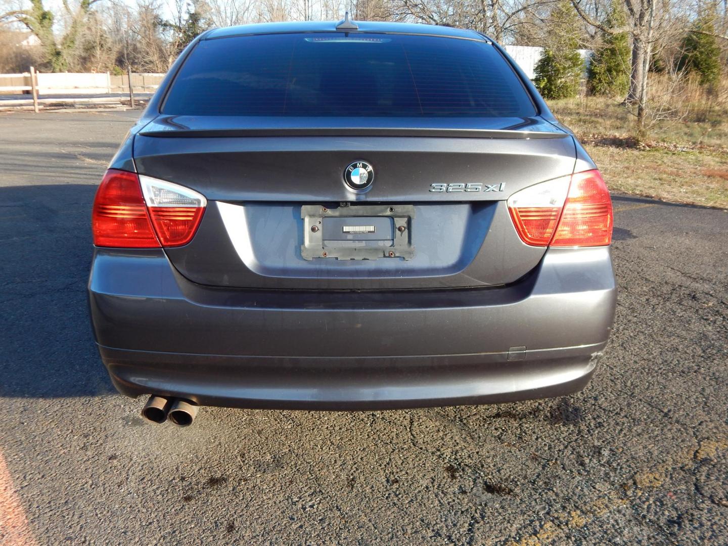 2006 Gray /Black BMW 3-Series 325xi Sedan (WBAVD135X6K) with an 3.0L L6 DOHC 24V engine, Manual transmission, located at 6528 Lower York Road, New Hope, PA, 18938, (215) 862-9555, 40.358707, -74.977882 - Here we have a BMW 3 series with a 3.0L inline 6 cylinder engine putting power to the ground via a AWD 6 speed manual transmission. Options include: black leather, wood trim, aftermarket radio, manual moving seats, sunroof, dual climate controls, tilt steering wheel, cruise control, automatic headli - Photo#7