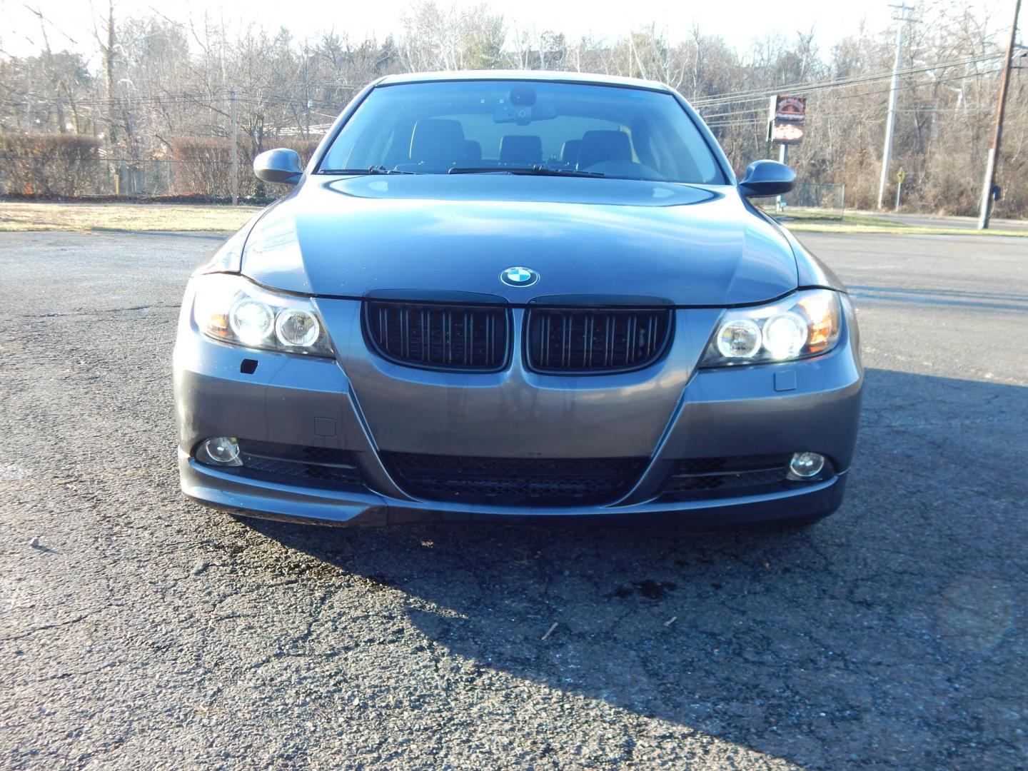 2006 Gray /Black BMW 3-Series 325xi Sedan (WBAVD135X6K) with an 3.0L L6 DOHC 24V engine, Manual transmission, located at 6528 Lower York Road, New Hope, PA, 18938, (215) 862-9555, 40.358707, -74.977882 - Here we have a BMW 3 series with a 3.0L inline 6 cylinder engine putting power to the ground via a AWD 6 speed manual transmission. Options include: black leather, wood trim, aftermarket radio, manual moving seats, sunroof, dual climate controls, tilt steering wheel, cruise control, automatic headli - Photo#6