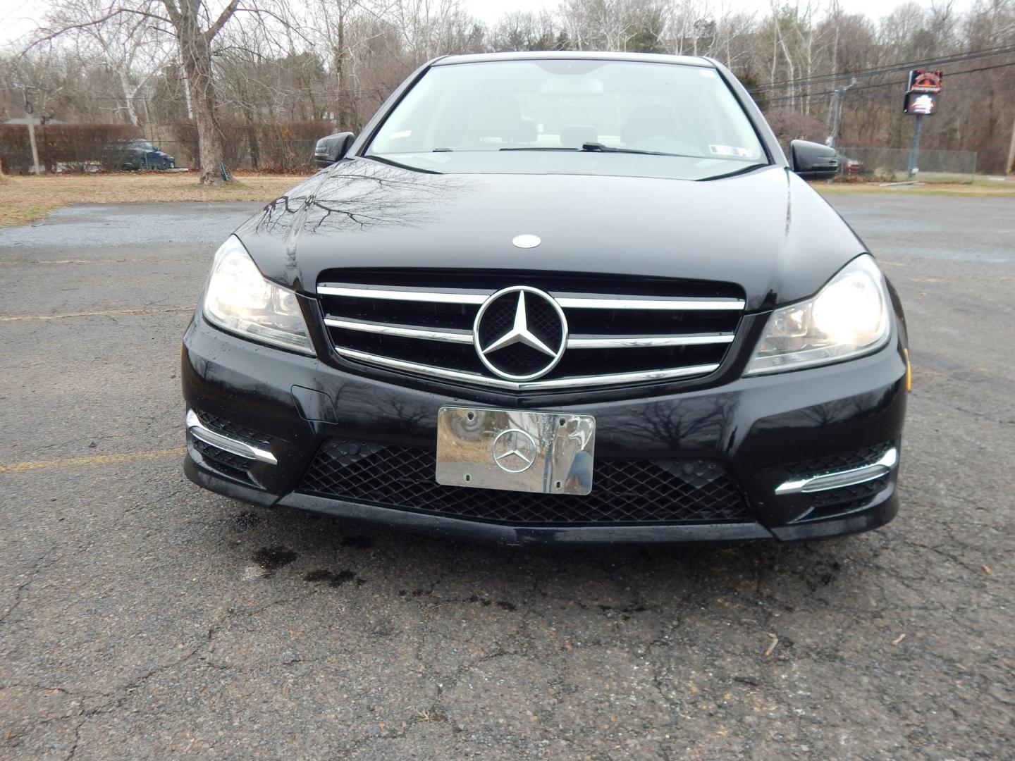 2014 Black /Tan Mercedes-Benz C-Class C300 4MATIC Sport Sedan (WDDGF8AB6EA) with an 3.0L V6 DOHC 24V engine, 7-Speed Automatic transmission, located at 6528 Lower York Road, New Hope, PA, 18938, (215) 862-9555, 40.358707, -74.977882 - Here we have a very nice Mercedes C300 with a V6 putting power to all four wheels via an automatic transmission. Options include: tan leather, wood trim, power seats, sunroof, heated front seats, AM/FM/CD/SIR/BLUETOOTH radio, Harman/Kardon speakers, dual climate controls, automatic headlights, fog l - Photo#6