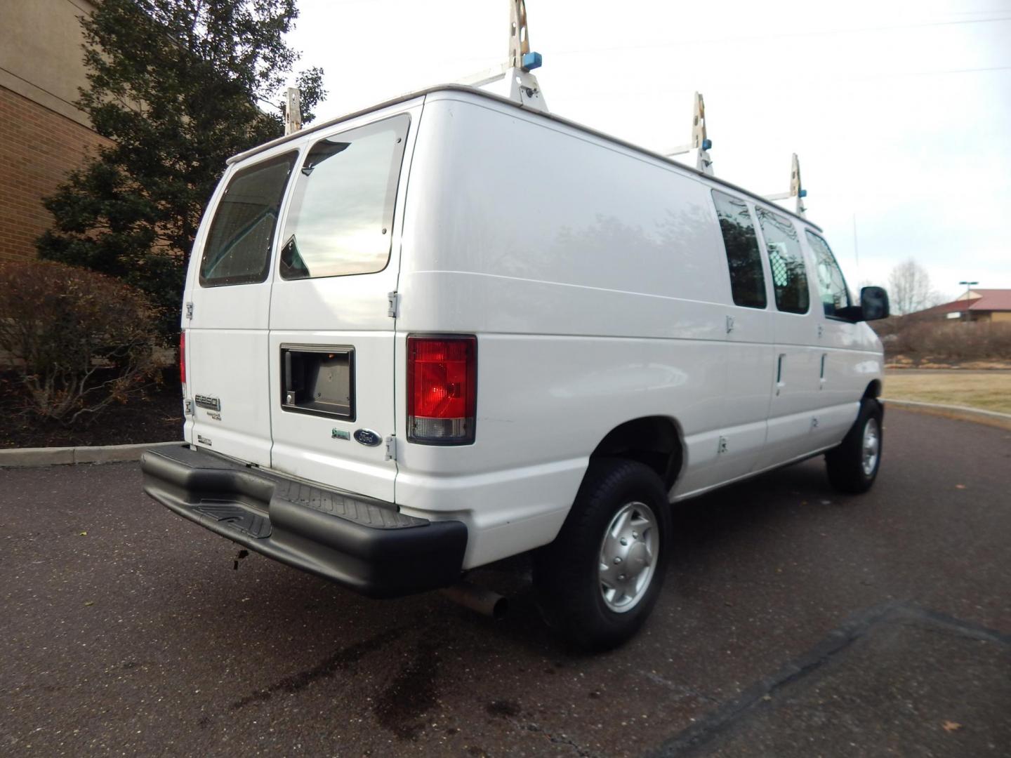 2014 White /Gray Ford E-Series Van E-250 (1FTNE2ELXED) with an 5.4L V8 SOHC 16V FFV engine, 4-Speed Automatic transmission, located at 6528 Lower York Road, New Hope, PA, 18938, (215) 862-9555, 40.358707, -74.977882 - Here we have a ONE OWNER, well taken care of Ford E250 work van with a 5.4L V8 putting power to the rear wheels via an automatic transmission. Options include: gray leather seats, manual moving seats, heat, A/C, AM/FM radio, Front windshield defroster, tilt steering wheel, power windows/locks/mirror - Photo#4