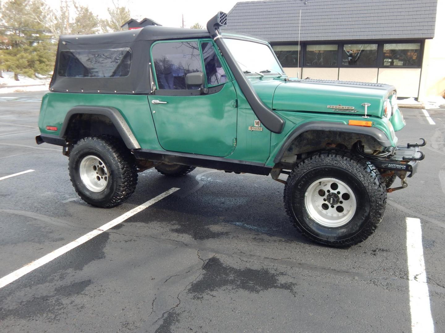 1970 Green /Black Jeepster Commando Commando (8705H176806) with an V8 engine, Automatic transmission, located at 6528 Lower York Road, New Hope, PA, 18938, (215) 862-9555, 40.358707, -74.977882 - Here we have a 1970 Jeepster Commando with a V8 engine swap and automatic transmission swap. This Jeepster has an edelbrock intake and a Holly sniper EFI. Black soft top. Starts right up every time for us. Fun vehicle to ride around town in or hit the trails. We are selling this vehicle on consignme - Photo#4