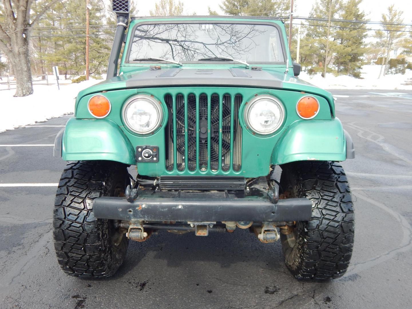 1970 Green /Black Jeepster Commando Commando (8705H176806) with an V8 engine, Automatic transmission, located at 6528 Lower York Road, New Hope, PA, 18938, (215) 862-9555, 40.358707, -74.977882 - Here we have a 1970 Jeepster Commando with a V8 engine swap and automatic transmission swap. This Jeepster has an edelbrock intake and a Holly sniper EFI. Black soft top. Starts right up every time for us. Fun vehicle to ride around town in or hit the trails. We are selling this vehicle on consignme - Photo#5