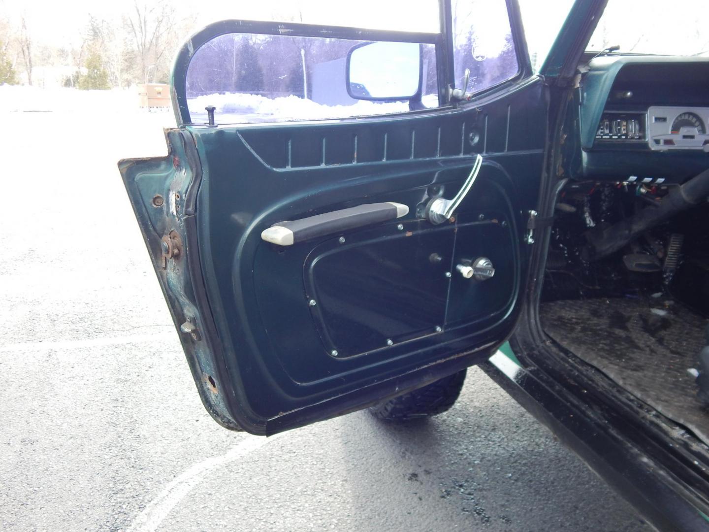 1970 Green /Black Jeepster Commando Commando (8705H176806) with an V8 engine, Automatic transmission, located at 6528 Lower York Road, New Hope, PA, 18938, (215) 862-9555, 40.358707, -74.977882 - Here we have a 1970 Jeepster Commando with a V8 engine swap and automatic transmission swap. This Jeepster has an edelbrock intake and a Holly sniper EFI. Black soft top. Starts right up every time for us. Fun vehicle to ride around town in or hit the trails. We are selling this vehicle on consignme - Photo#7