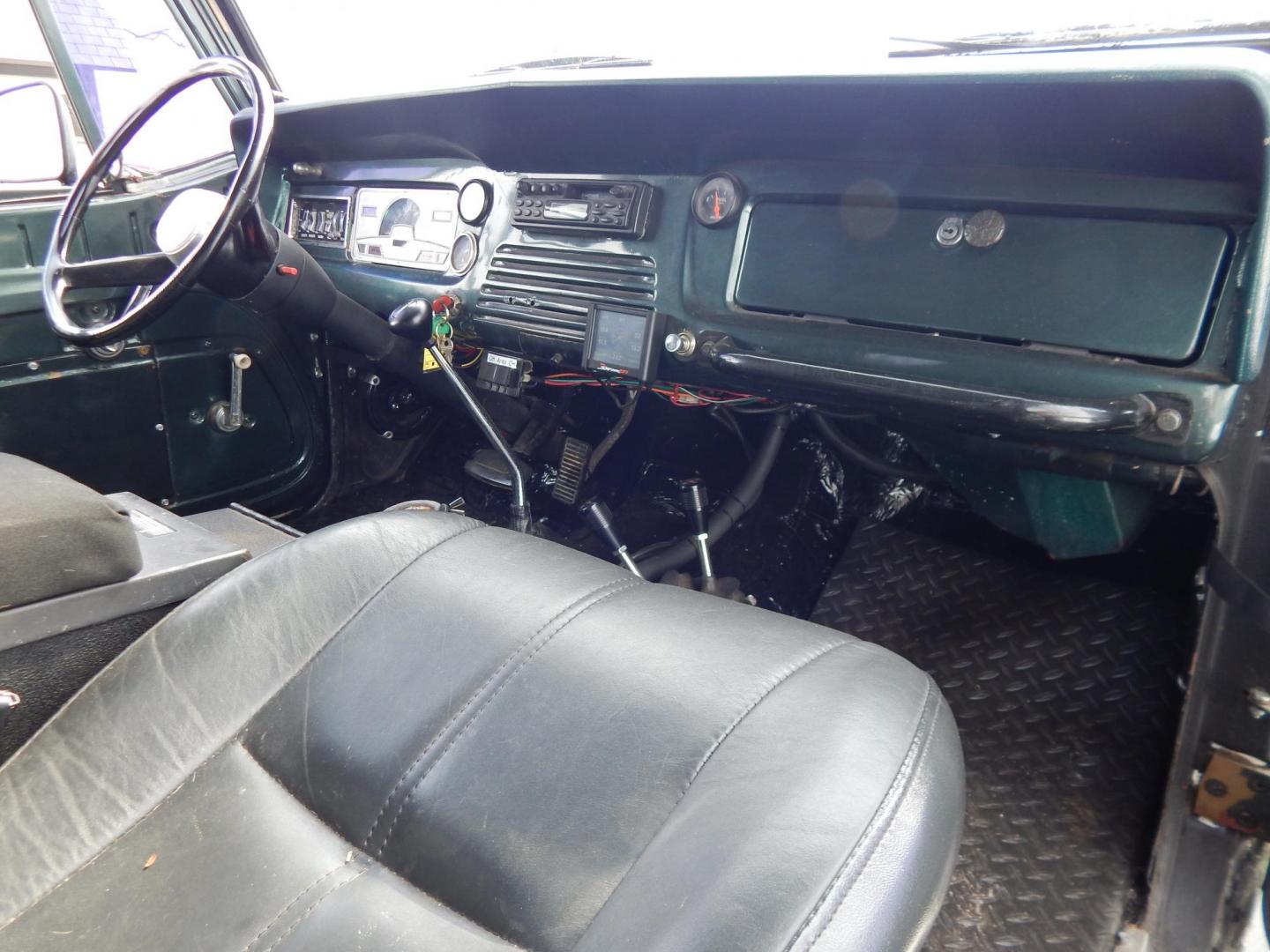1970 Green /Black Jeepster Commando Commando (8705H176806) with an V8 engine, Automatic transmission, located at 6528 Lower York Road, New Hope, PA, 18938, (215) 862-9555, 40.358707, -74.977882 - Here we have a 1970 Jeepster Commando with a V8 engine swap and automatic transmission swap. This Jeepster has an edelbrock intake and a Holly sniper EFI. Black soft top. Starts right up every time for us. Fun vehicle to ride around town in or hit the trails. We are selling this vehicle on consignme - Photo#12
