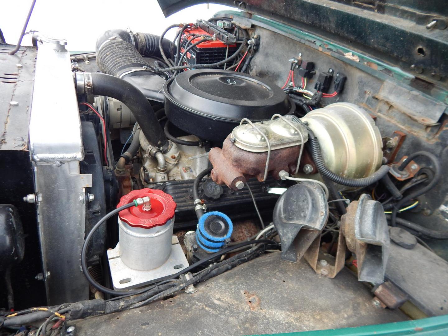 1970 Green /Black Jeepster Commando Commando (8705H176806) with an V8 engine, Automatic transmission, located at 6528 Lower York Road, New Hope, PA, 18938, (215) 862-9555, 40.358707, -74.977882 - Here we have a 1970 Jeepster Commando with a V8 engine swap and automatic transmission swap. This Jeepster has an edelbrock intake and a Holly sniper EFI. Black soft top. Starts right up every time for us. Fun vehicle to ride around town in or hit the trails. We are selling this vehicle on consignme - Photo#17