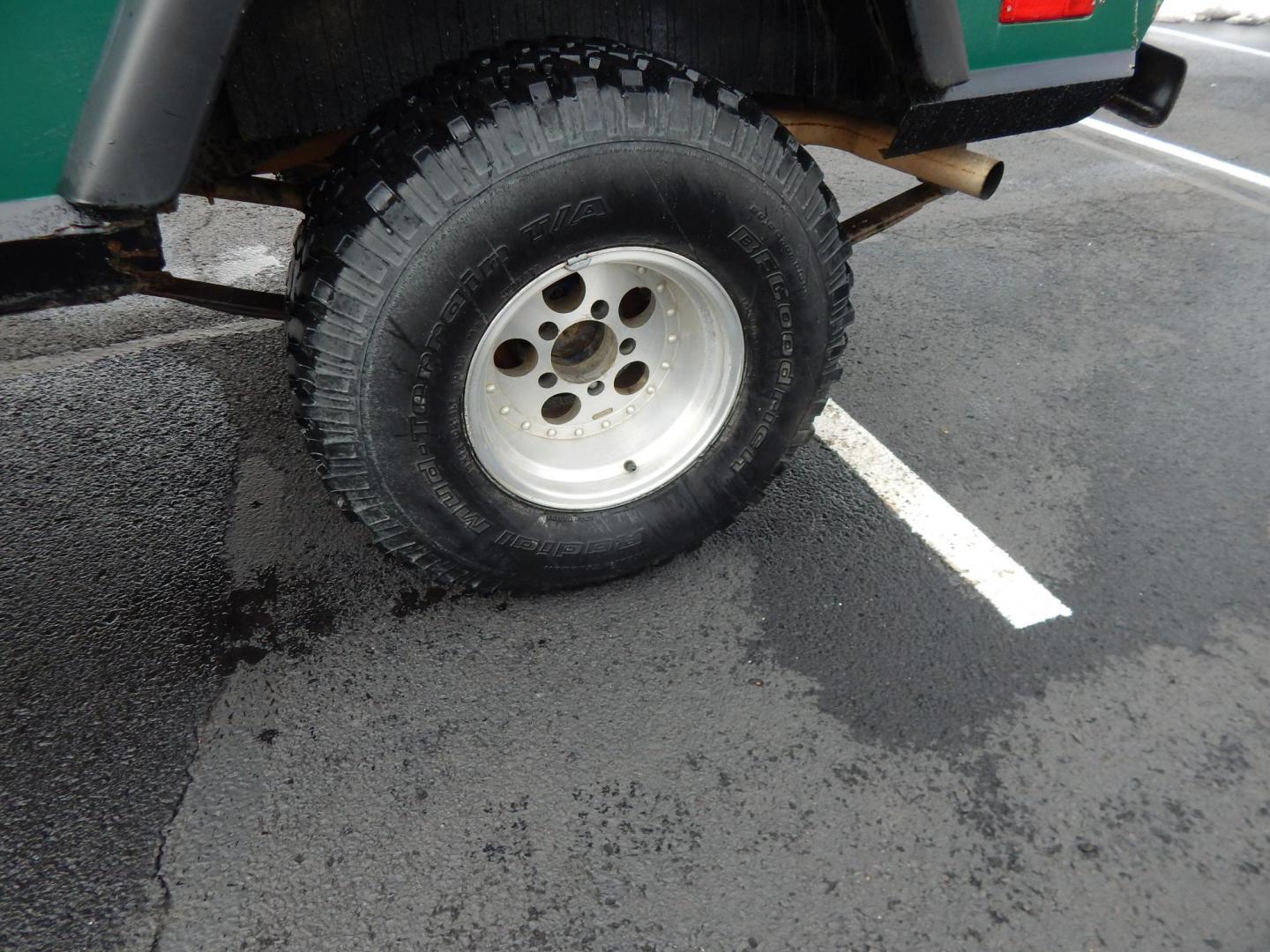 1970 Green /Black Jeepster Commando Commando (8705H176806) with an V8 engine, Automatic transmission, located at 6528 Lower York Road, New Hope, PA, 18938, (215) 862-9555, 40.358707, -74.977882 - Here we have a 1970 Jeepster Commando with a V8 engine swap and automatic transmission swap. This Jeepster has an edelbrock intake and a Holly sniper EFI. Black soft top. Starts right up every time for us. Fun vehicle to ride around town in or hit the trails. We are selling this vehicle on consignme - Photo#20