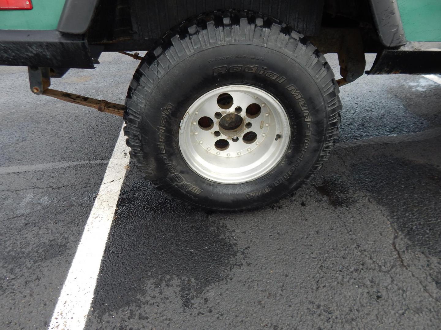 1970 Green /Black Jeepster Commando Commando (8705H176806) with an V8 engine, Automatic transmission, located at 6528 Lower York Road, New Hope, PA, 18938, (215) 862-9555, 40.358707, -74.977882 - Here we have a 1970 Jeepster Commando with a V8 engine swap and automatic transmission swap. This Jeepster has an edelbrock intake and a Holly sniper EFI. Black soft top. Starts right up every time for us. Fun vehicle to ride around town in or hit the trails. We are selling this vehicle on consignme - Photo#21