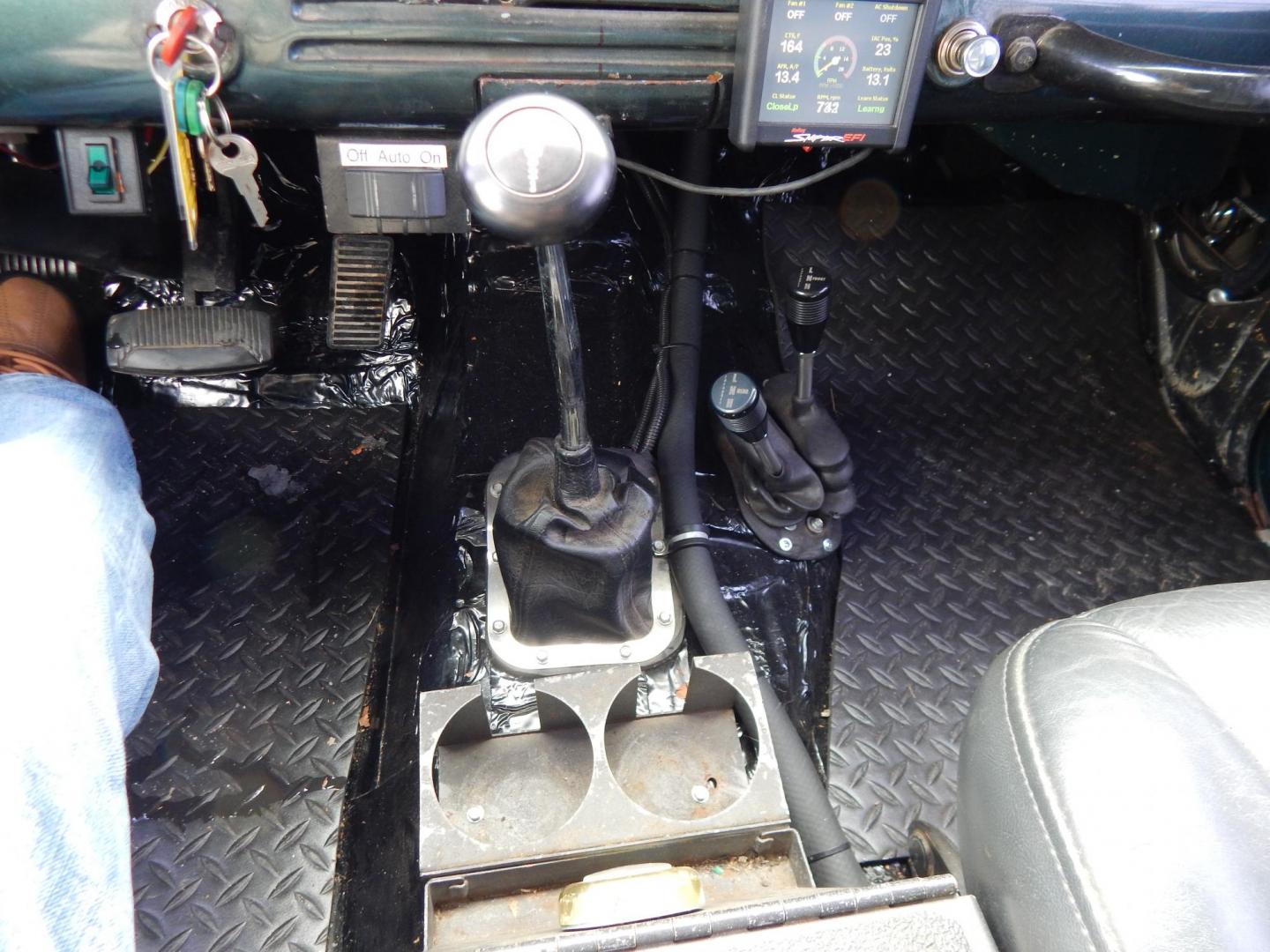 1970 Green /Black Jeepster Commando Commando (8705H176806) with an V8 engine, Automatic transmission, located at 6528 Lower York Road, New Hope, PA, 18938, (215) 862-9555, 40.358707, -74.977882 - Here we have a 1970 Jeepster Commando with a V8 engine swap and automatic transmission swap. This Jeepster has an edelbrock intake and a Holly sniper EFI. Black soft top. Starts right up every time for us. Fun vehicle to ride around town in or hit the trails. We are selling this vehicle on consignme - Photo#26