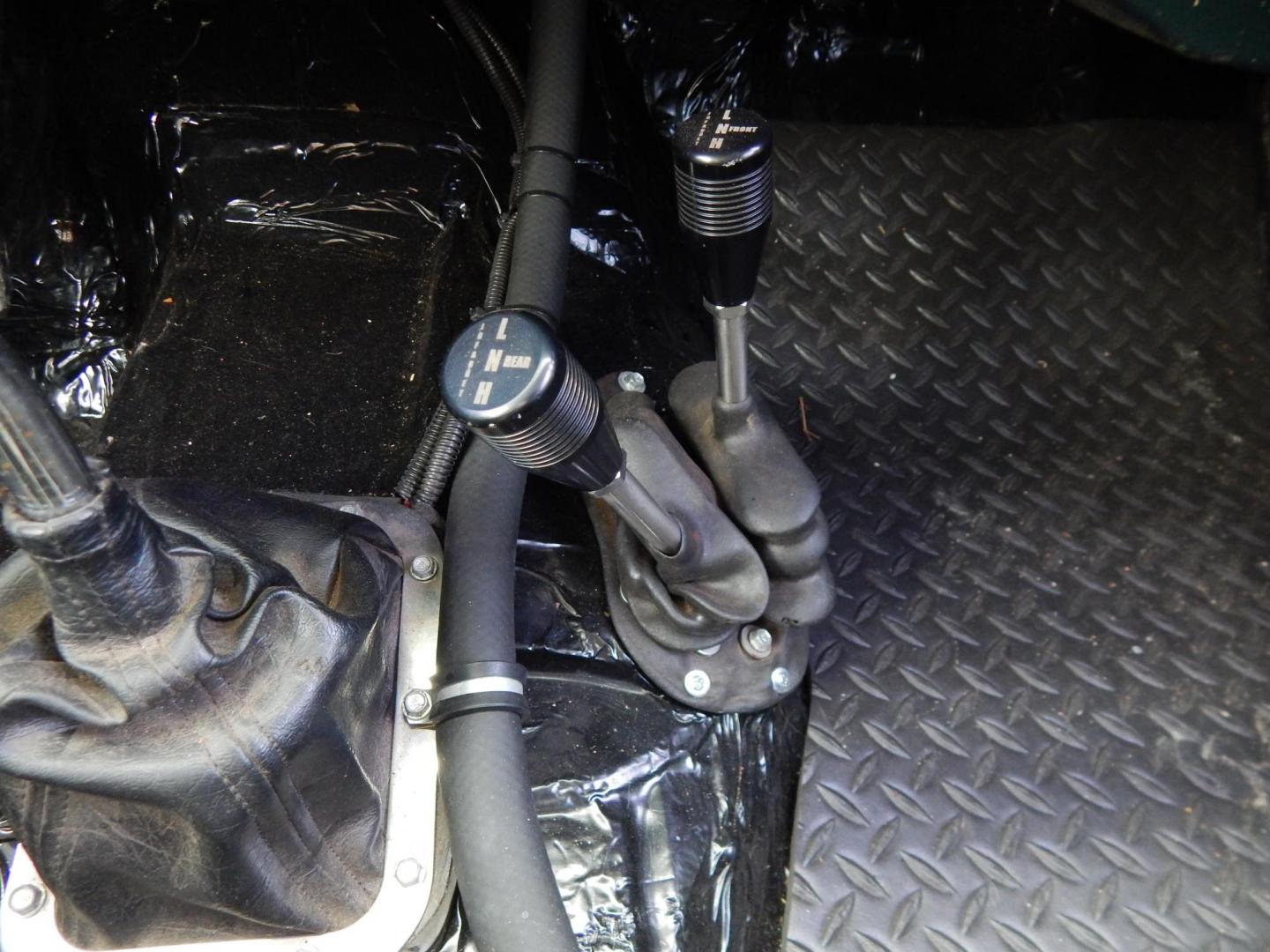 1970 Green /Black Jeepster Commando Commando (8705H176806) with an V8 engine, Automatic transmission, located at 6528 Lower York Road, New Hope, PA, 18938, (215) 862-9555, 40.358707, -74.977882 - Here we have a 1970 Jeepster Commando with a V8 engine swap and automatic transmission swap. This Jeepster has an edelbrock intake and a Holly sniper EFI. Black soft top. Starts right up every time for us. Fun vehicle to ride around town in or hit the trails. We are selling this vehicle on consignme - Photo#27