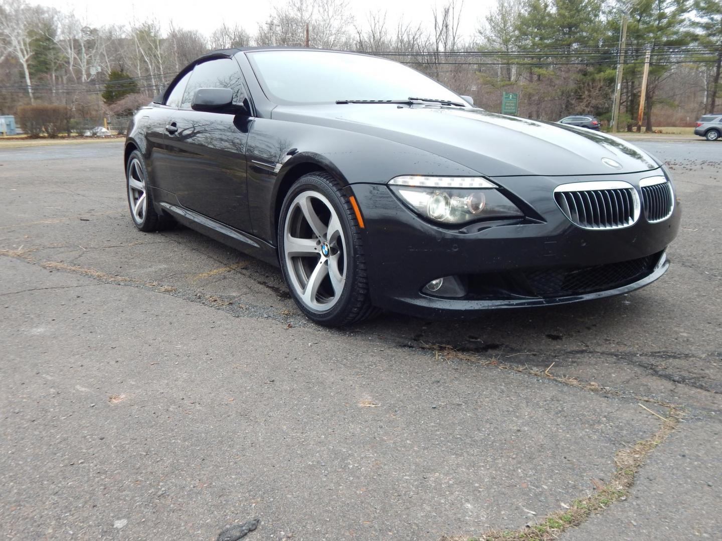 2009 Black /Tan BMW 6-Series 650i Convertible Sport (WBAEB53569C) with an 4.8L V8 DOHC 32V engine, Automatic transmission, located at 6528 Lower York Road, New Hope, PA, 18938, (215) 862-9555, 40.358707, -74.977882 - Here we have a very cool BMW 650i convertible with a 4.8L V8 putting power to the rear wheels via an automatic transmission. Options include: tan leather with wood trim, power seats, heated front seats, heated steering wheel, dual climate controls, power convertible top, AM/FM/SAT/CD/AUX radio, powe - Photo#5