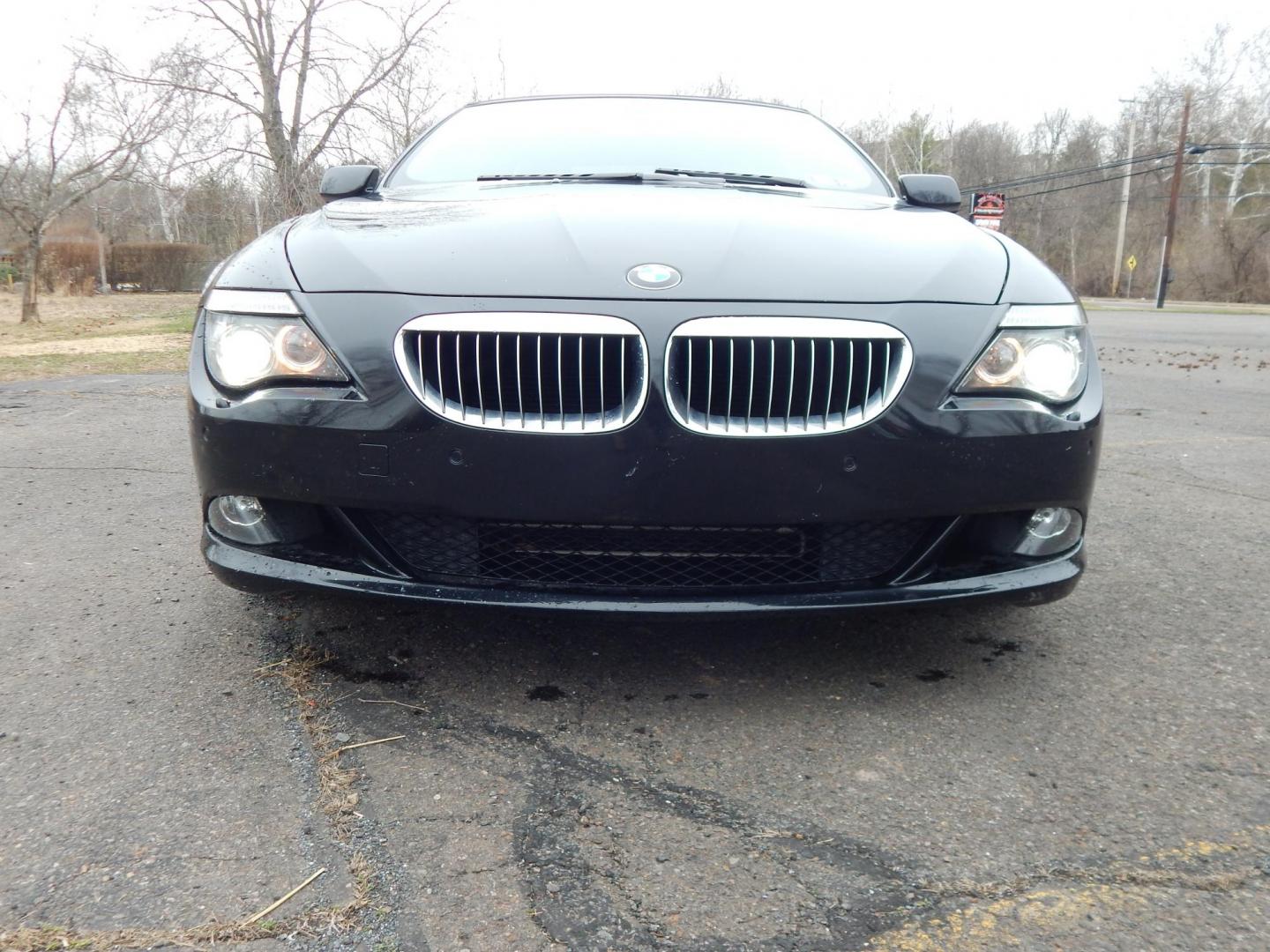 2009 Black /Tan BMW 6-Series 650i Convertible Sport (WBAEB53569C) with an 4.8L V8 DOHC 32V engine, Automatic transmission, located at 6528 Lower York Road, New Hope, PA, 18938, (215) 862-9555, 40.358707, -74.977882 - Here we have a very cool BMW 650i convertible with a 4.8L V8 putting power to the rear wheels via an automatic transmission. Options include: tan leather with wood trim, power seats, heated front seats, heated steering wheel, dual climate controls, power convertible top, AM/FM/SAT/CD/AUX radio, powe - Photo#6