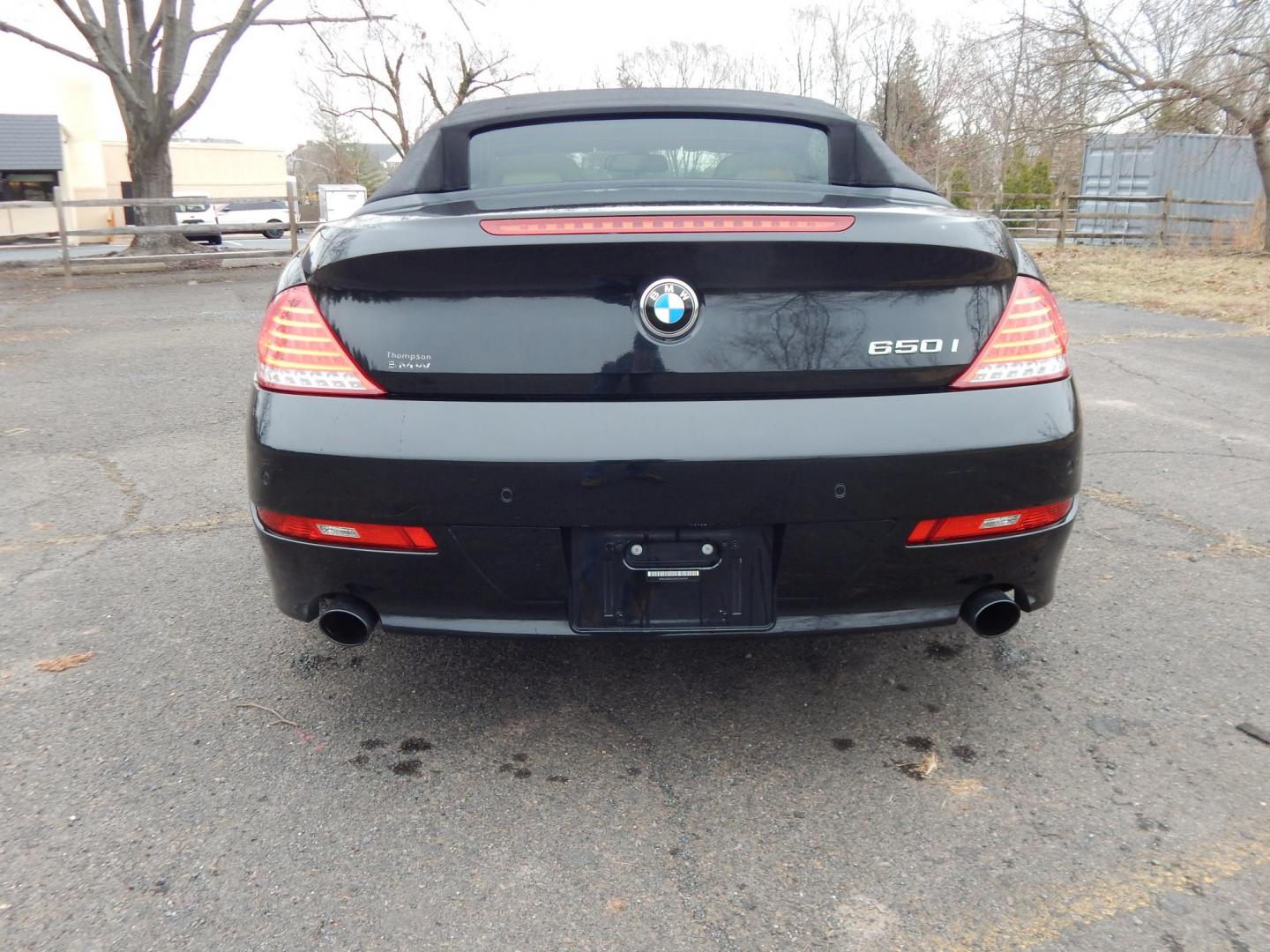 2009 Black /Tan BMW 6-Series 650i Convertible Sport (WBAEB53569C) with an 4.8L V8 DOHC 32V engine, Automatic transmission, located at 6528 Lower York Road, New Hope, PA, 18938, (215) 862-9555, 40.358707, -74.977882 - Here we have a very cool BMW 650i convertible with a 4.8L V8 putting power to the rear wheels via an automatic transmission. Options include: tan leather with wood trim, power seats, heated front seats, heated steering wheel, dual climate controls, power convertible top, AM/FM/SAT/CD/AUX radio, powe - Photo#8