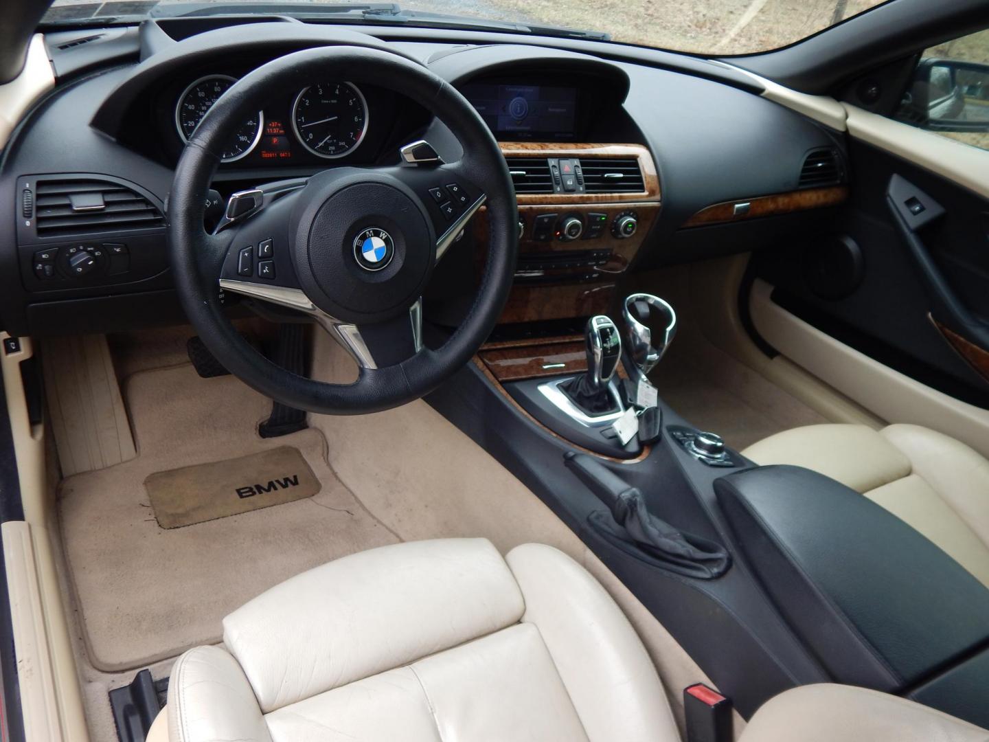 2009 Black /Tan BMW 6-Series 650i Convertible Sport (WBAEB53569C) with an 4.8L V8 DOHC 32V engine, Automatic transmission, located at 6528 Lower York Road, New Hope, PA, 18938, (215) 862-9555, 40.358707, -74.977882 - Here we have a very cool BMW 650i convertible with a 4.8L V8 putting power to the rear wheels via an automatic transmission. Options include: tan leather with wood trim, power seats, heated front seats, heated steering wheel, dual climate controls, power convertible top, AM/FM/SAT/CD/AUX radio, powe - Photo#11