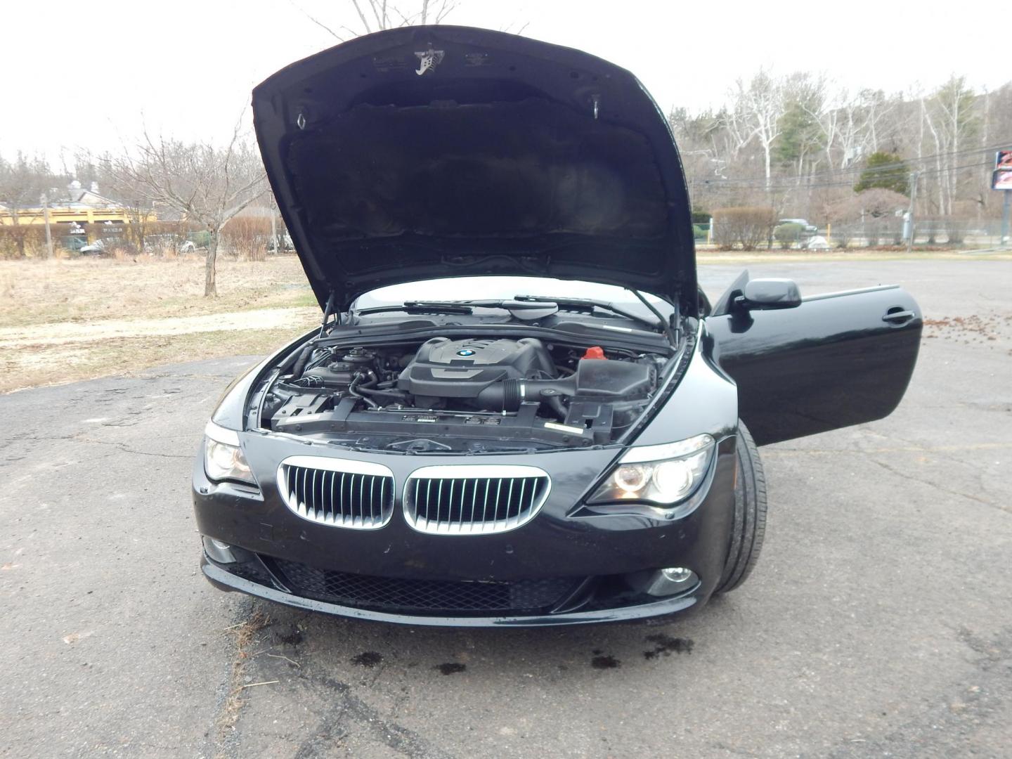 2009 Black /Tan BMW 6-Series 650i Convertible Sport (WBAEB53569C) with an 4.8L V8 DOHC 32V engine, Automatic transmission, located at 6528 Lower York Road, New Hope, PA, 18938, (215) 862-9555, 40.358707, -74.977882 - Here we have a very cool BMW 650i convertible with a 4.8L V8 putting power to the rear wheels via an automatic transmission. Options include: tan leather with wood trim, power seats, heated front seats, heated steering wheel, dual climate controls, power convertible top, AM/FM/SAT/CD/AUX radio, powe - Photo#23
