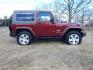 2010 Burgundy /Gray Jeep Wrangler Sahara 4WD (1J4AA5D11AL) with an 3.8L V6 OHV 12V engine, Manual transmission, located at 6528 Lower York Road, New Hope, PA, 18938, (215) 862-9555, 40.358707, -74.977882 - Here we have a very fun Jeep Wrangler with a 3.8L V6 putting power to the ground via a 6 speed manual 4x4 transmission. Options include: gray cloth seats, manual moving seats, heat, A/C, AM/FM/CD/SAT/AUX radio, 3 piece removable hard top, power windows and power locks, cruise control, tilt steering - Photo#4