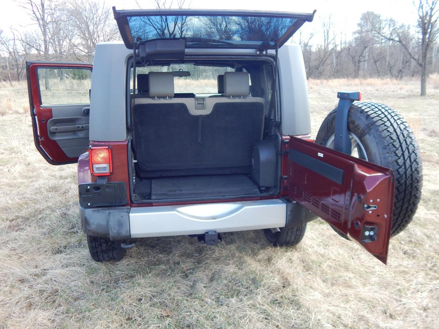 2010 Burgundy /Gray Jeep Wrangler Sahara 4WD (1J4AA5D11AL) with an 3.8L V6 OHV 12V engine, Manual transmission, located at 6528 Lower York Road, New Hope, PA, 18938, (215) 862-9555, 40.358707, -74.977882 - Here we have a very fun Jeep Wrangler with a 3.8L V6 putting power to the ground via a 6 speed manual 4x4 transmission. Options include: gray cloth seats, manual moving seats, heat, A/C, AM/FM/CD/SAT/AUX radio, 3 piece removable hard top, power windows and power locks, cruise control, tilt steering - Photo#10