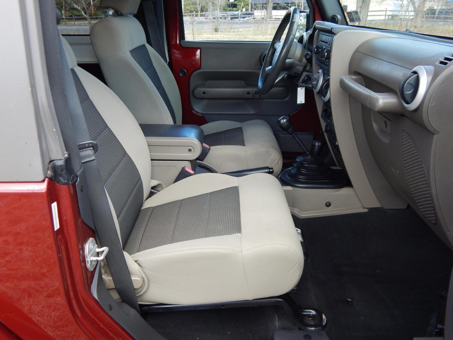 2010 Burgundy /Gray Jeep Wrangler Sahara 4WD (1J4AA5D11AL) with an 3.8L V6 OHV 12V engine, Manual transmission, located at 6528 Lower York Road, New Hope, PA, 18938, (215) 862-9555, 40.358707, -74.977882 - Here we have a very fun Jeep Wrangler with a 3.8L V6 putting power to the ground via a 6 speed manual 4x4 transmission. Options include: gray cloth seats, manual moving seats, heat, A/C, AM/FM/CD/SAT/AUX radio, 3 piece removable hard top, power windows and power locks, cruise control, tilt steering - Photo#12