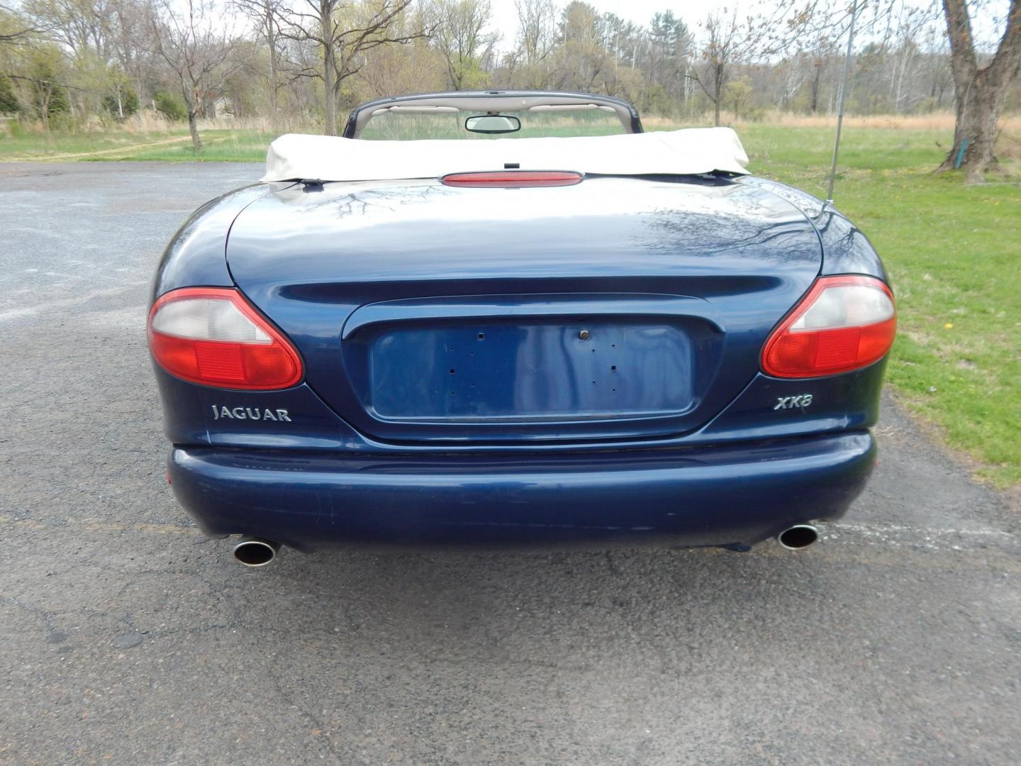 2000 Blue Jaguar XK8 Convertible (SAJJA42C6YN) with an 4.0L V8 DOHC 32V engine, 5-Speed Automatic Overdrive transmission, located at 6528 Lower York Road, New Hope, PA, 18938, (215) 862-9555, 40.358707, -74.977882 - 2000 Jaguar XK 8. Roadster......8 cylinder engine runs well, automatic transmission shifts on time, this is a 2 owner automobile showing 37 service records on a clean car fax. Although the body and interior are a little rough around, we have priced this Jag for someone to have a semi collectable au - Photo#6