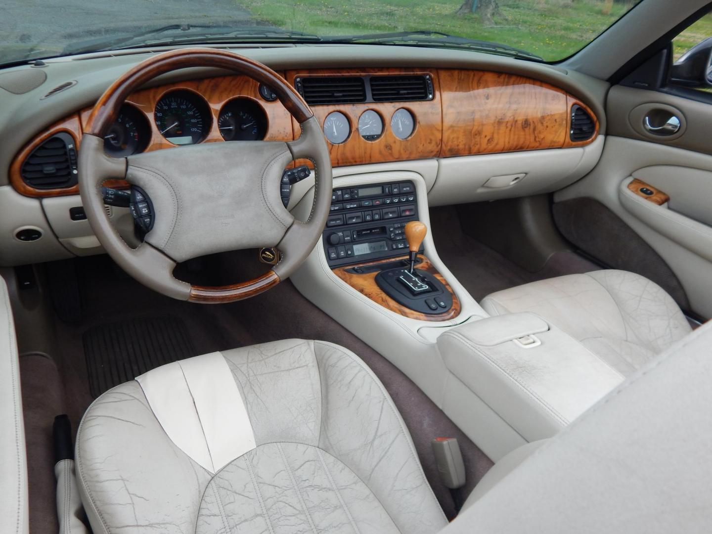 2000 Blue Jaguar XK8 Convertible (SAJJA42C6YN) with an 4.0L V8 DOHC 32V engine, 5-Speed Automatic Overdrive transmission, located at 6528 Lower York Road, New Hope, PA, 18938, (215) 862-9555, 40.358707, -74.977882 - 2000 Jaguar XK 8. Roadster......8 cylinder engine runs well, automatic transmission shifts on time, this is a 2 owner automobile showing 37 service records on a clean car fax. Although the body and interior are a little rough around, we have priced this Jag for someone to have a semi collectable au - Photo#9