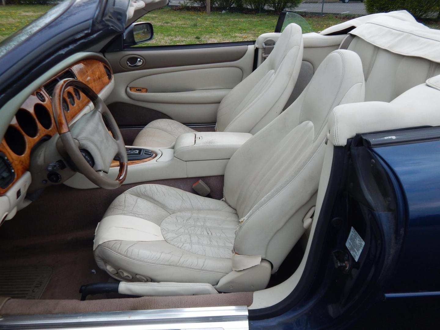 2000 Blue Jaguar XK8 Convertible (SAJJA42C6YN) with an 4.0L V8 DOHC 32V engine, 5-Speed Automatic Overdrive transmission, located at 6528 Lower York Road, New Hope, PA, 18938, (215) 862-9555, 40.358707, -74.977882 - 2000 Jaguar XK 8. Roadster......8 cylinder engine runs well, automatic transmission shifts on time, this is a 2 owner automobile showing 37 service records on a clean car fax. Although the body and interior are a little rough around, we have priced this Jag for someone to have a semi collectable au - Photo#12