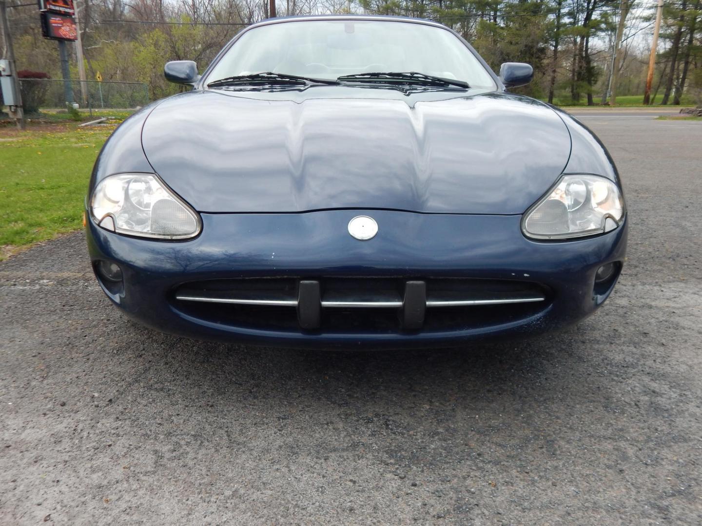 2000 Blue Jaguar XK8 Convertible (SAJJA42C6YN) with an 4.0L V8 DOHC 32V engine, 5-Speed Automatic Overdrive transmission, located at 6528 Lower York Road, New Hope, PA, 18938, (215) 862-9555, 40.358707, -74.977882 - 2000 Jaguar XK 8. Roadster......8 cylinder engine runs well, automatic transmission shifts on time, this is a 2 owner automobile showing 37 service records on a clean car fax. Although the body and interior are a little rough around, we have priced this Jag for someone to have a semi collectable au - Photo#18