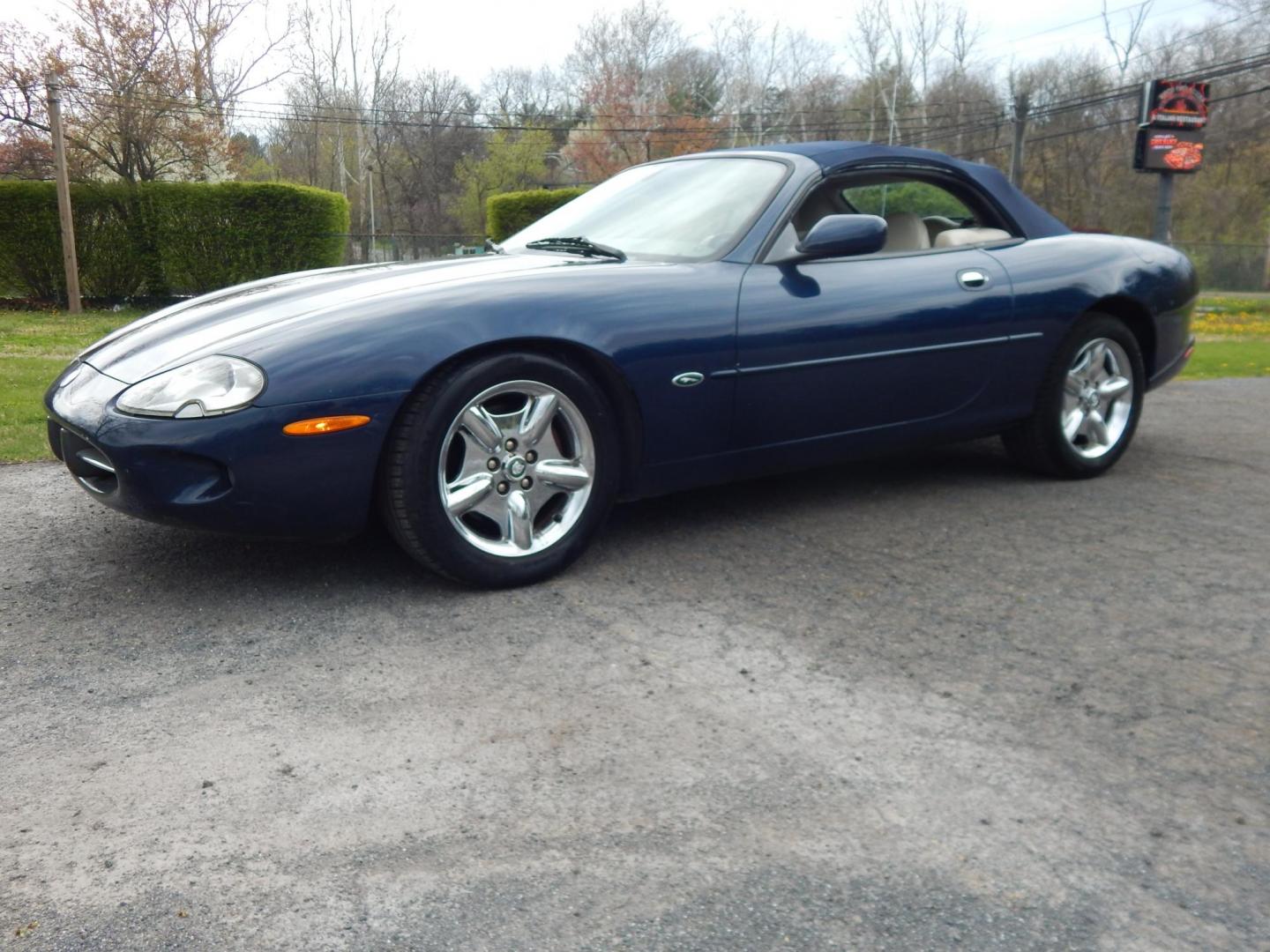 2000 Blue Jaguar XK8 Convertible (SAJJA42C6YN) with an 4.0L V8 DOHC 32V engine, 5-Speed Automatic Overdrive transmission, located at 6528 Lower York Road, New Hope, PA, 18938, (215) 862-9555, 40.358707, -74.977882 - 2000 Jaguar XK 8. Roadster......8 cylinder engine runs well, automatic transmission shifts on time, this is a 2 owner automobile showing 37 service records on a clean car fax. Although the body and interior are a little rough around, we have priced this Jag for someone to have a semi collectable au - Photo#4