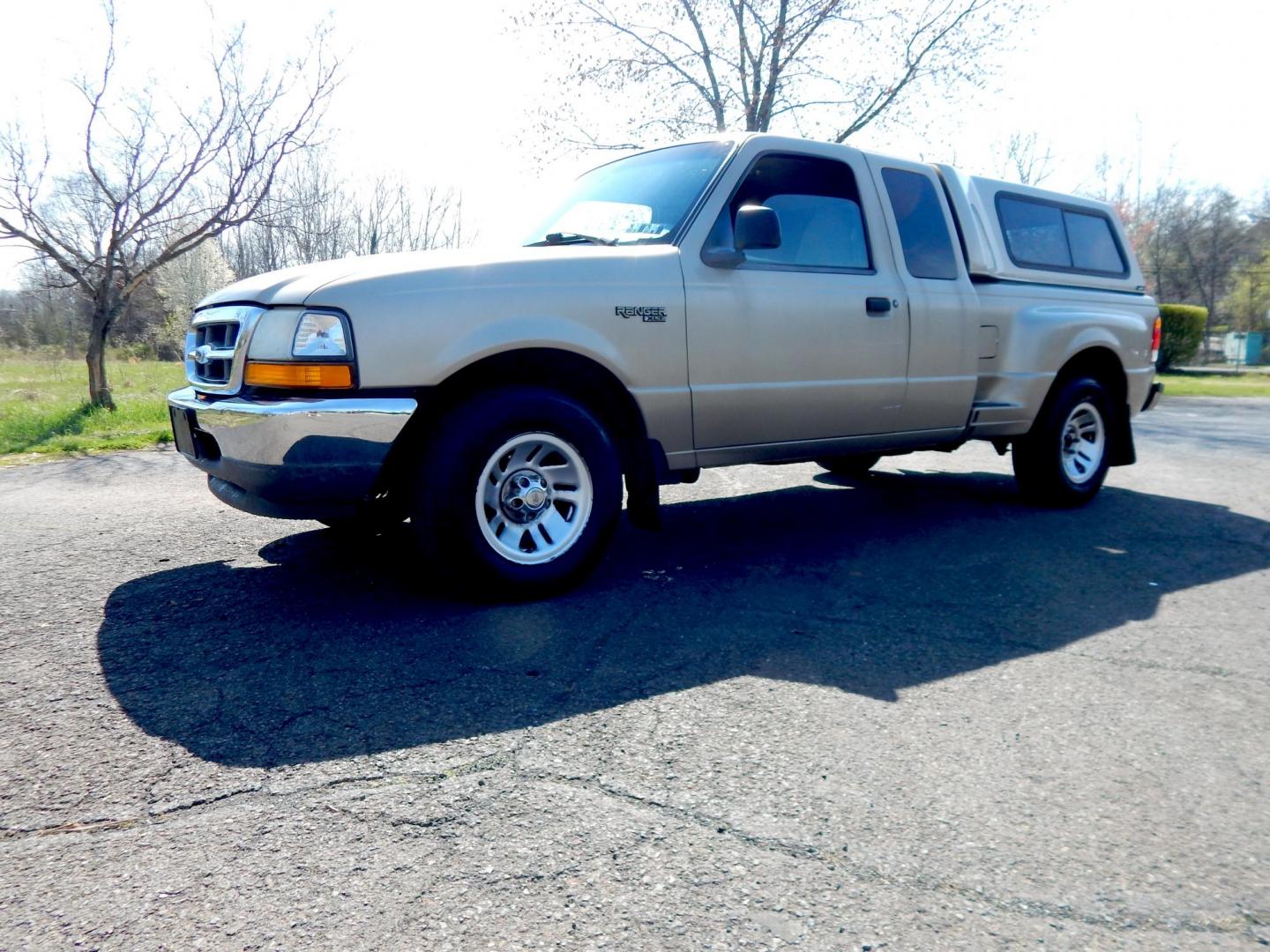 1999 Gold /Tan Ford Ranger XL SuperCab 2WD (1FTYR14V1XT) with an 3.0L V6 OHV 12V FFV engine, Automatic transmission, located at 6528 Lower York Road, New Hope, PA, 18938, (215) 862-9555, 40.358707, -74.977882 - Here we have a no accident, 3 owner Ford Ranger with a 3.0L V6 putting power to the rear wheels via an automatic transmission. Options include: tan cloth, manual seats, AM/FM/CD/TAPE radio, power windows and locks, tilt steering wheel, jump seats, 15 inch wheels, bed cap and side step. This truck ha - Photo#0