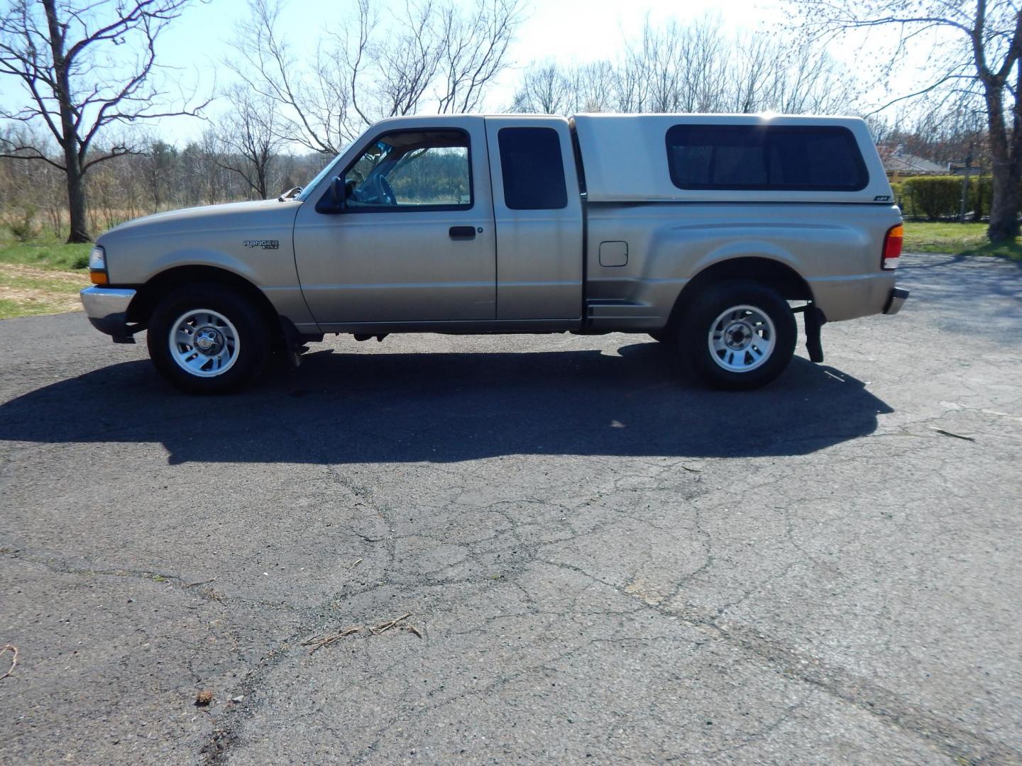 1999 Gold /Tan Ford Ranger XL SuperCab 2WD (1FTYR14V1XT) with an 3.0L V6 OHV 12V FFV engine, Automatic transmission, located at 6528 Lower York Road, New Hope, PA, 18938, (215) 862-9555, 40.358707, -74.977882 - Here we have a no accident, 3 owner Ford Ranger with a 3.0L V6 putting power to the rear wheels via an automatic transmission. Options include: tan cloth, manual seats, AM/FM/CD/TAPE radio, power windows and locks, tilt steering wheel, jump seats, 15 inch wheels, bed cap and side step. This truck ha - Photo#1
