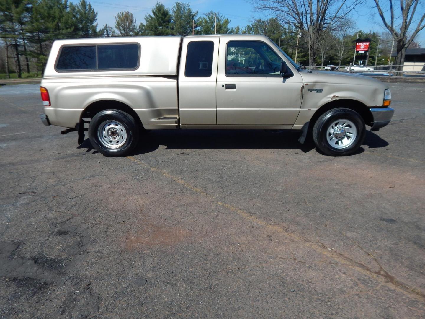 1999 Gold /Tan Ford Ranger XL SuperCab 2WD (1FTYR14V1XT) with an 3.0L V6 OHV 12V FFV engine, Automatic transmission, located at 6528 Lower York Road, New Hope, PA, 18938, (215) 862-9555, 40.358707, -74.977882 - Here we have a no accident, 3 owner Ford Ranger with a 3.0L V6 putting power to the rear wheels via an automatic transmission. Options include: tan cloth, manual seats, AM/FM/CD/TAPE radio, power windows and locks, tilt steering wheel, jump seats, 15 inch wheels, bed cap and side step. This truck ha - Photo#4