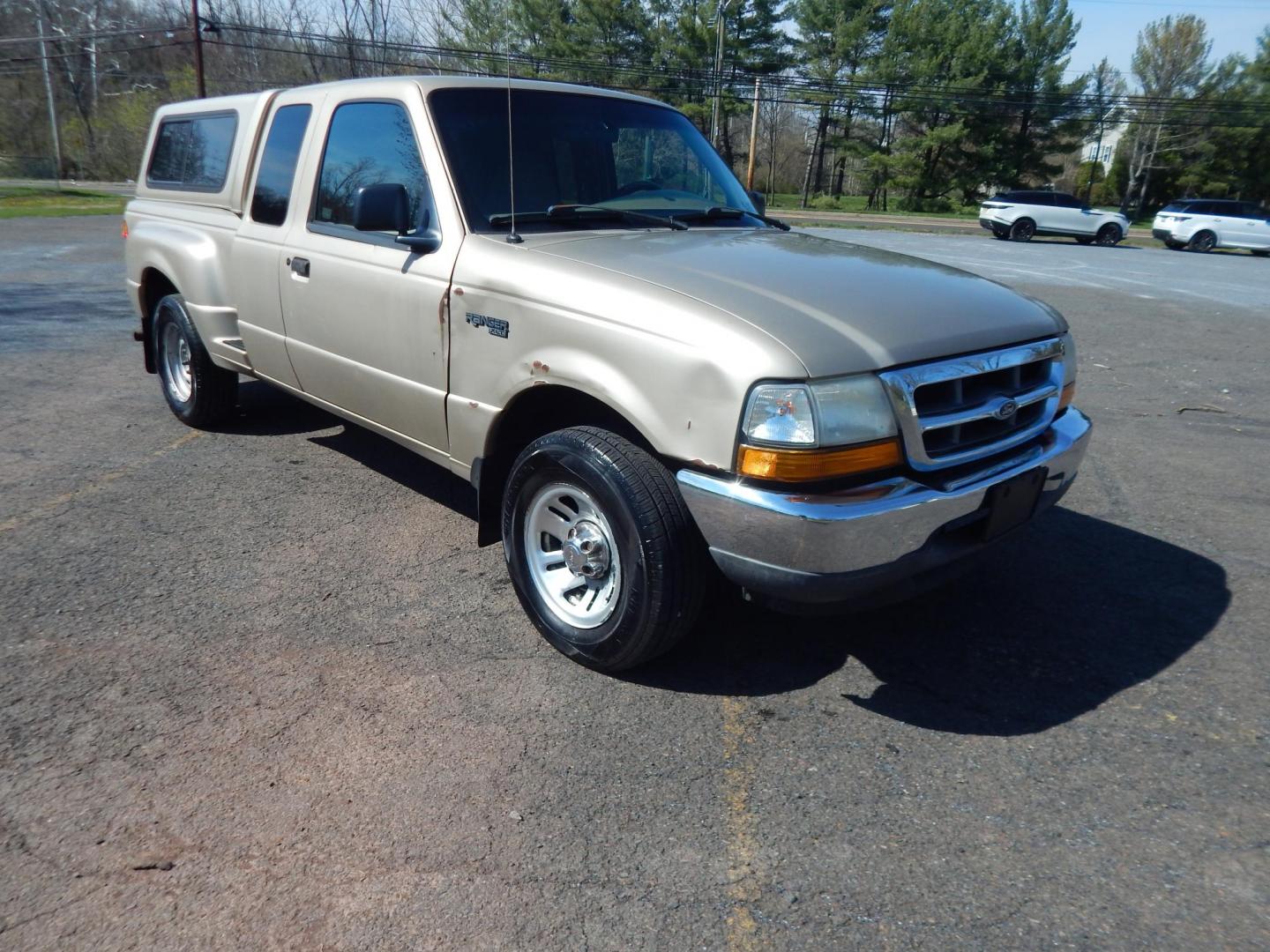 1999 Gold /Tan Ford Ranger XL SuperCab 2WD (1FTYR14V1XT) with an 3.0L V6 OHV 12V FFV engine, Automatic transmission, located at 6528 Lower York Road, New Hope, PA, 18938, (215) 862-9555, 40.358707, -74.977882 - Here we have a no accident, 3 owner Ford Ranger with a 3.0L V6 putting power to the rear wheels via an automatic transmission. Options include: tan cloth, manual seats, AM/FM/CD/TAPE radio, power windows and locks, tilt steering wheel, jump seats, 15 inch wheels, bed cap and side step. This truck ha - Photo#5