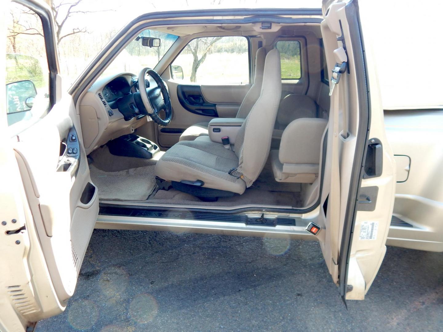 1999 Gold /Tan Ford Ranger XL SuperCab 2WD (1FTYR14V1XT) with an 3.0L V6 OHV 12V FFV engine, Automatic transmission, located at 6528 Lower York Road, New Hope, PA, 18938, (215) 862-9555, 40.358707, -74.977882 - Here we have a no accident, 3 owner Ford Ranger with a 3.0L V6 putting power to the rear wheels via an automatic transmission. Options include: tan cloth, manual seats, AM/FM/CD/TAPE radio, power windows and locks, tilt steering wheel, jump seats, 15 inch wheels, bed cap and side step. This truck ha - Photo#12